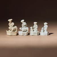 Four Miniature Chinese Blanc-de-Chine Porcelain 'European' Whistles, Late 17th-Early 18th Century — 清中期 德化白瓷西人鬥獸哨四件
