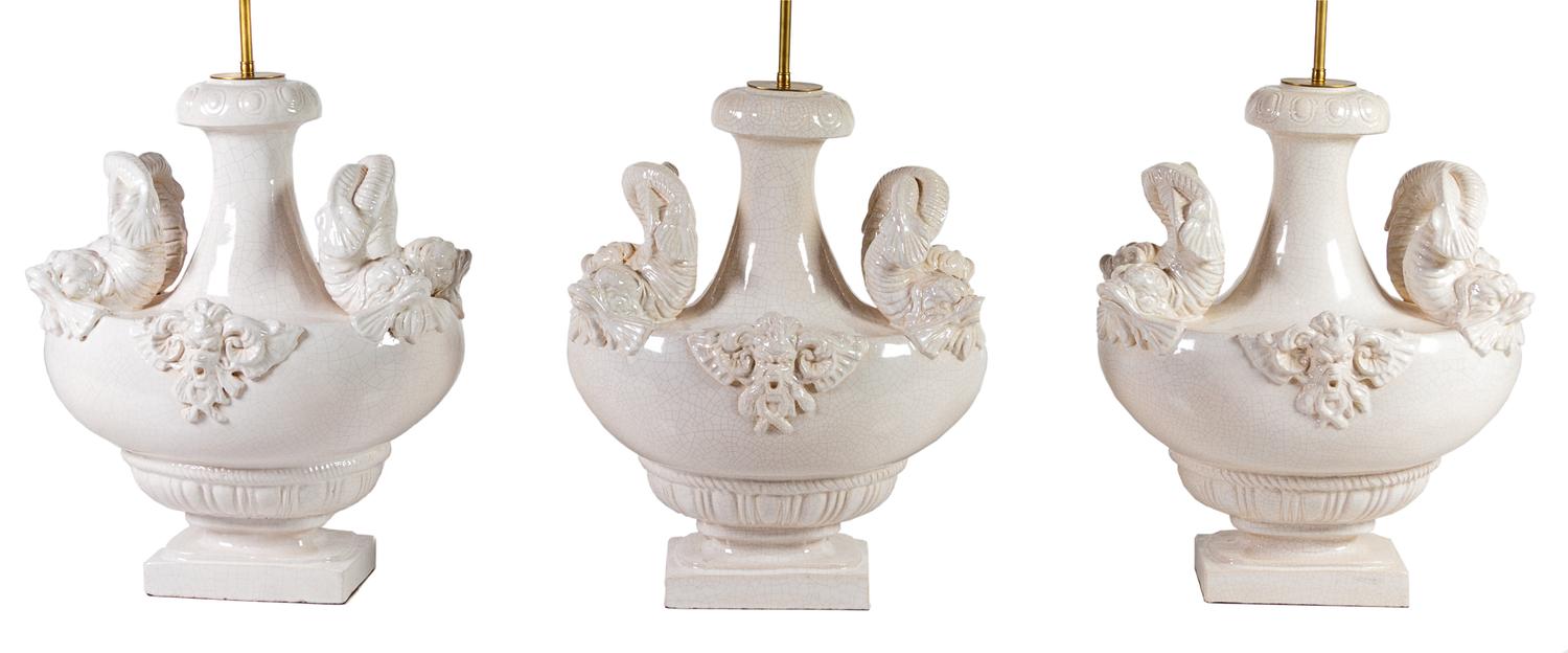 Two Pairs of Italian White-Glazed Ceramic Lamps Height overall 35 inches. — MID-20TH CENTURY