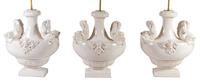 Two Pairs of Italian White-Glazed Ceramic Lamps Height overall 35 inches. — MID-20TH CENTURY
