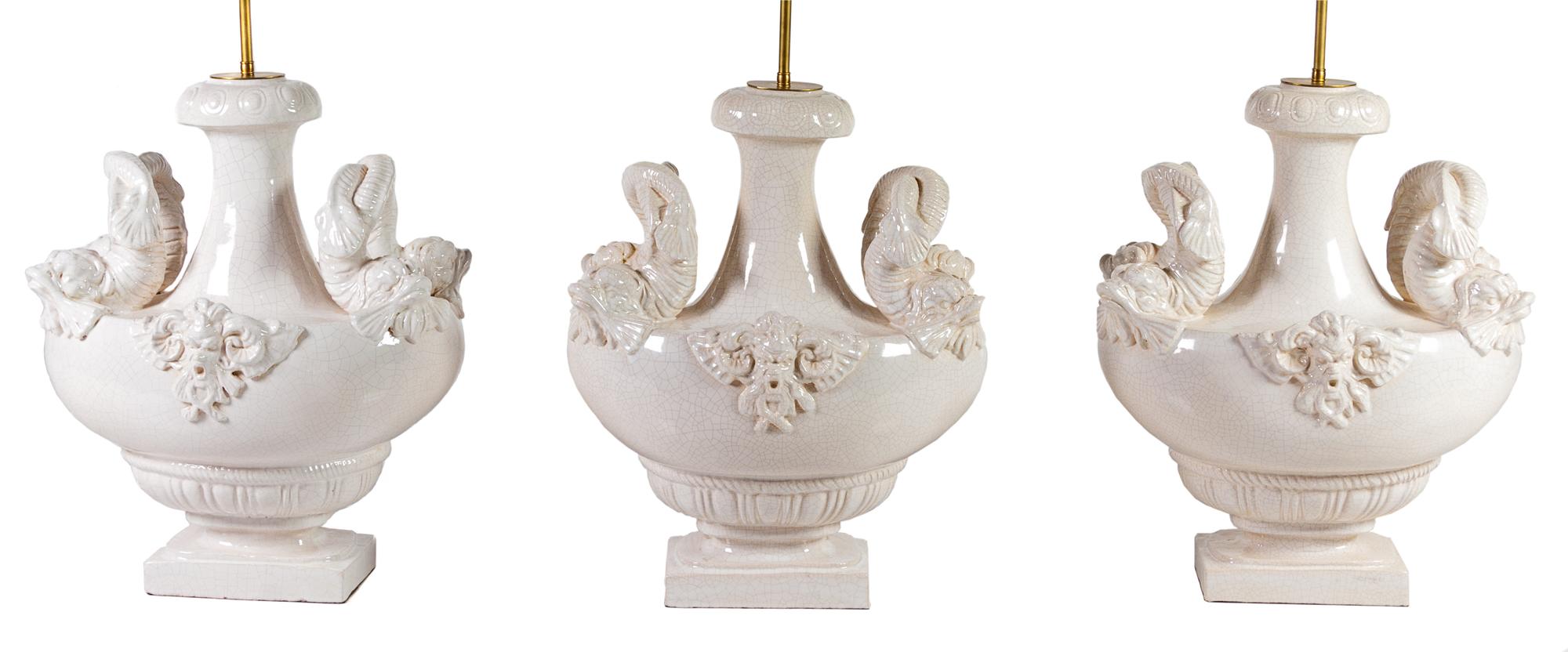 Two Pairs of Italian White-Glazed Ceramic Lamps Height overall 35 inches. — MID-20TH CENTURY