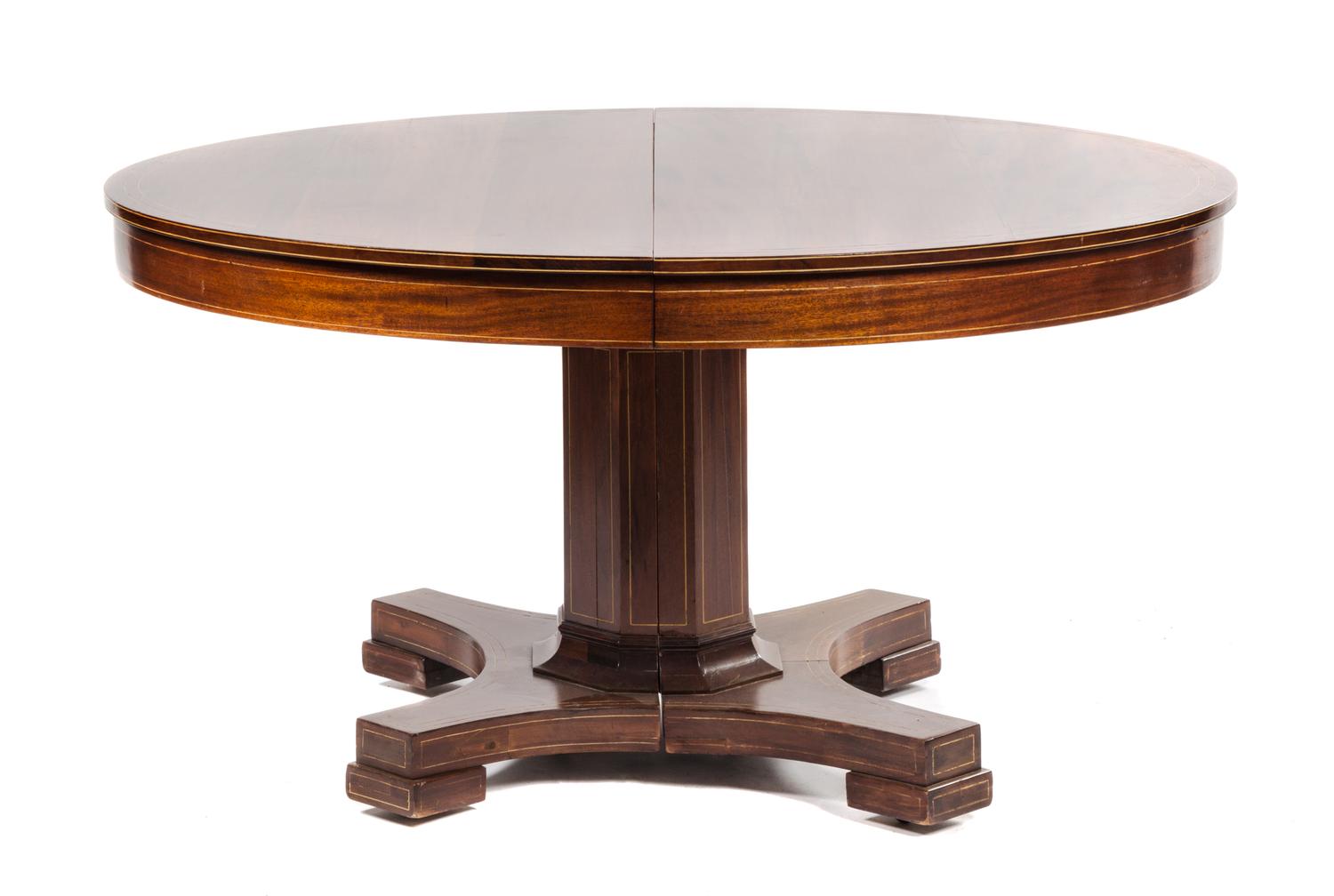 An American Extension Dining Table Diameter 54 1/4 inches. — R.J. HORNER & CO, NEW YORK