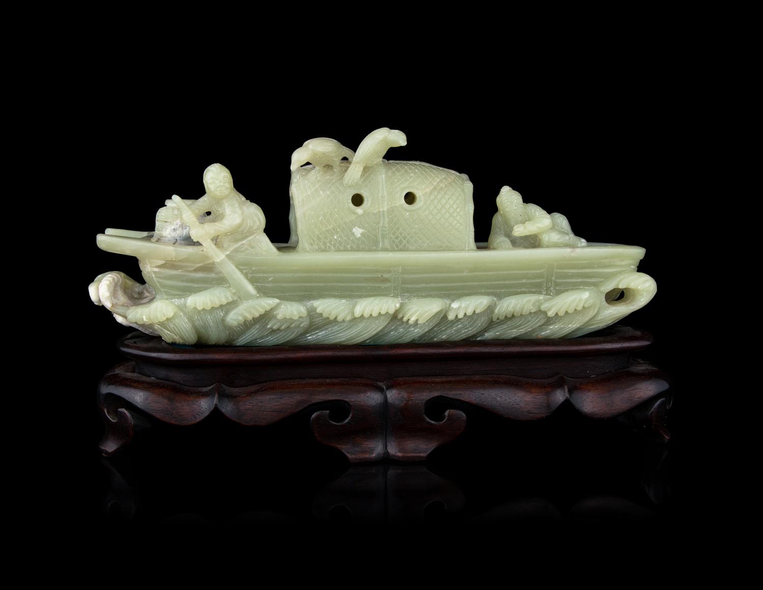 A Chinese Celadon Jade Boat
