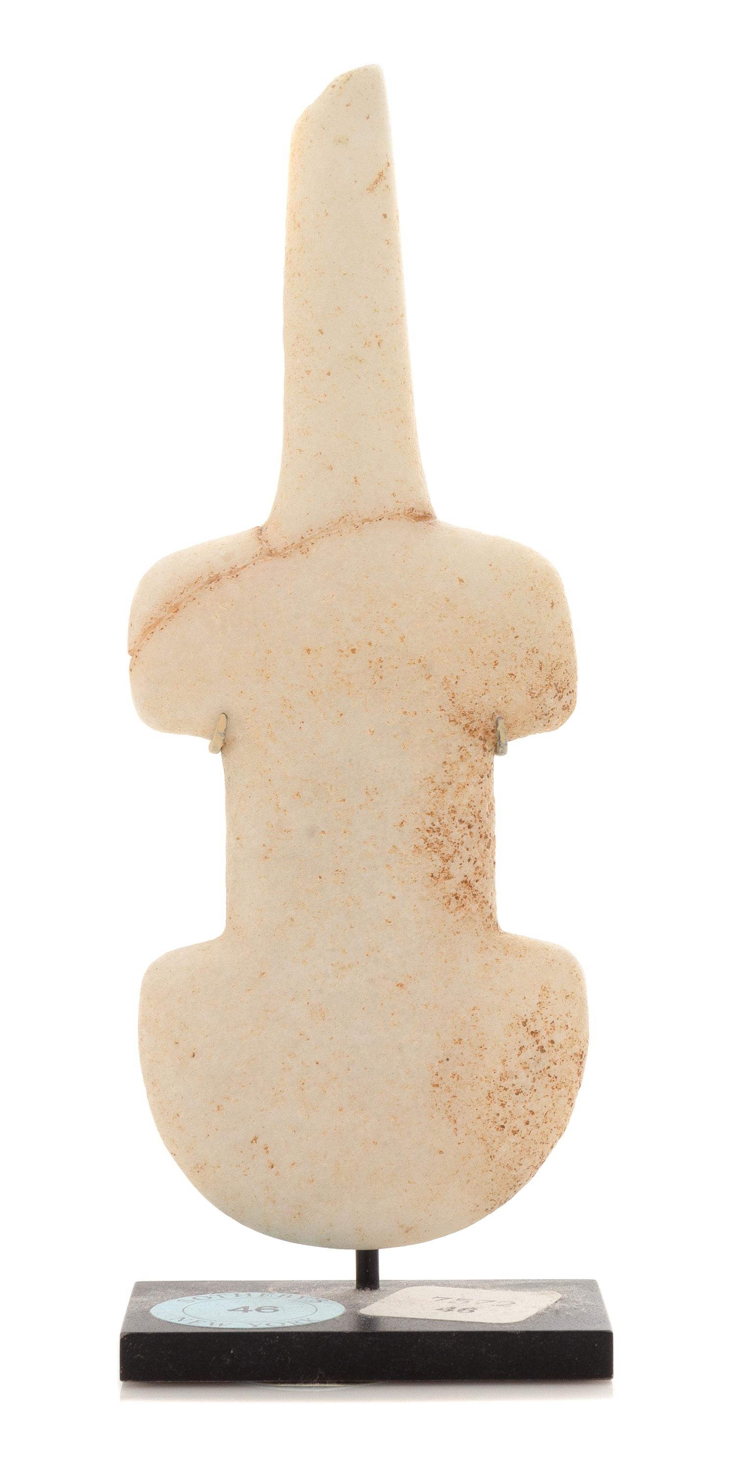 A Cycladic Marble Idol Height 6 inches. — EARLY BRONZE AGE I, CIRCA 3000-2800 B.C.E.