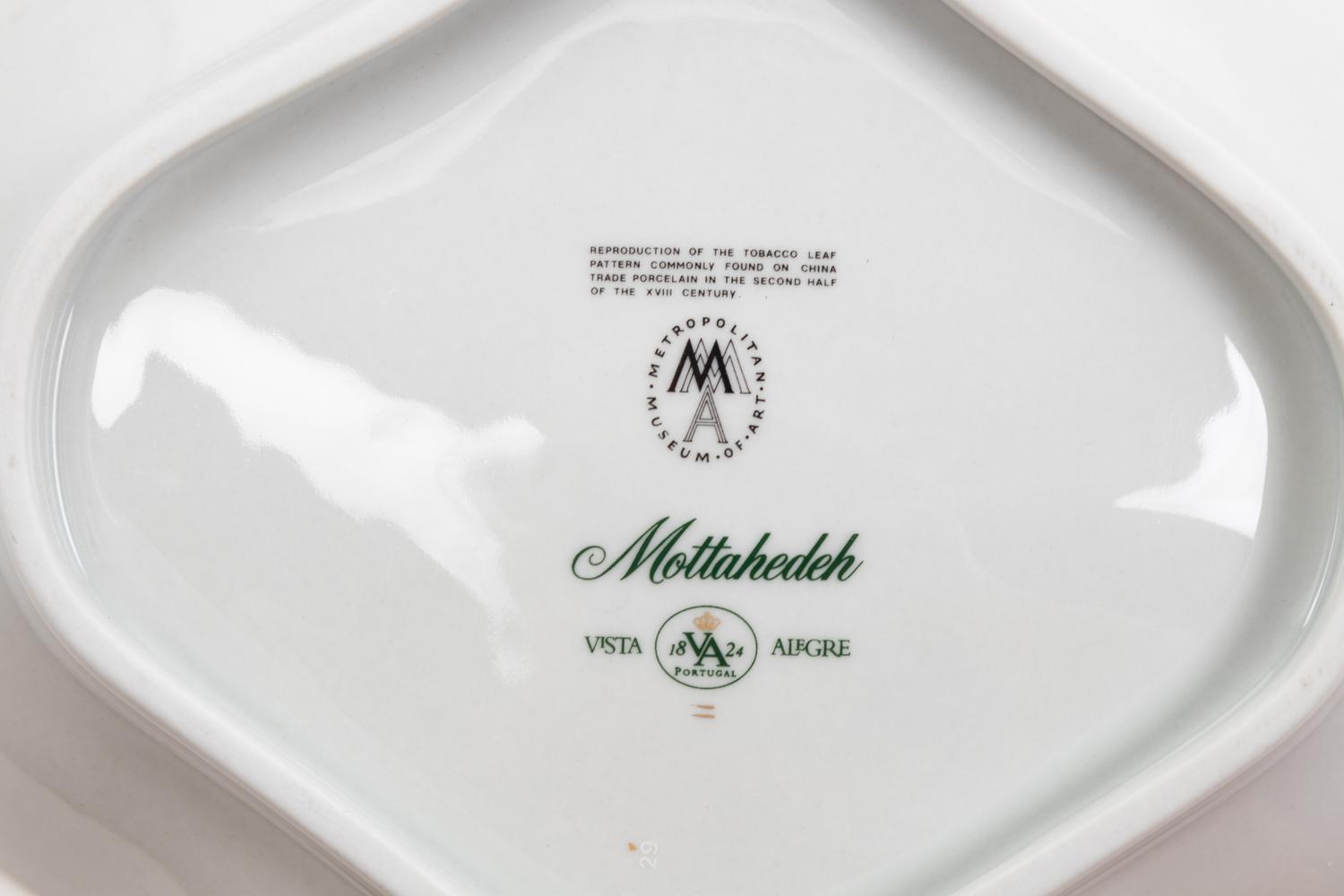 A Collection of Mottahedeh Tobacco Leaf Porcelain Articles