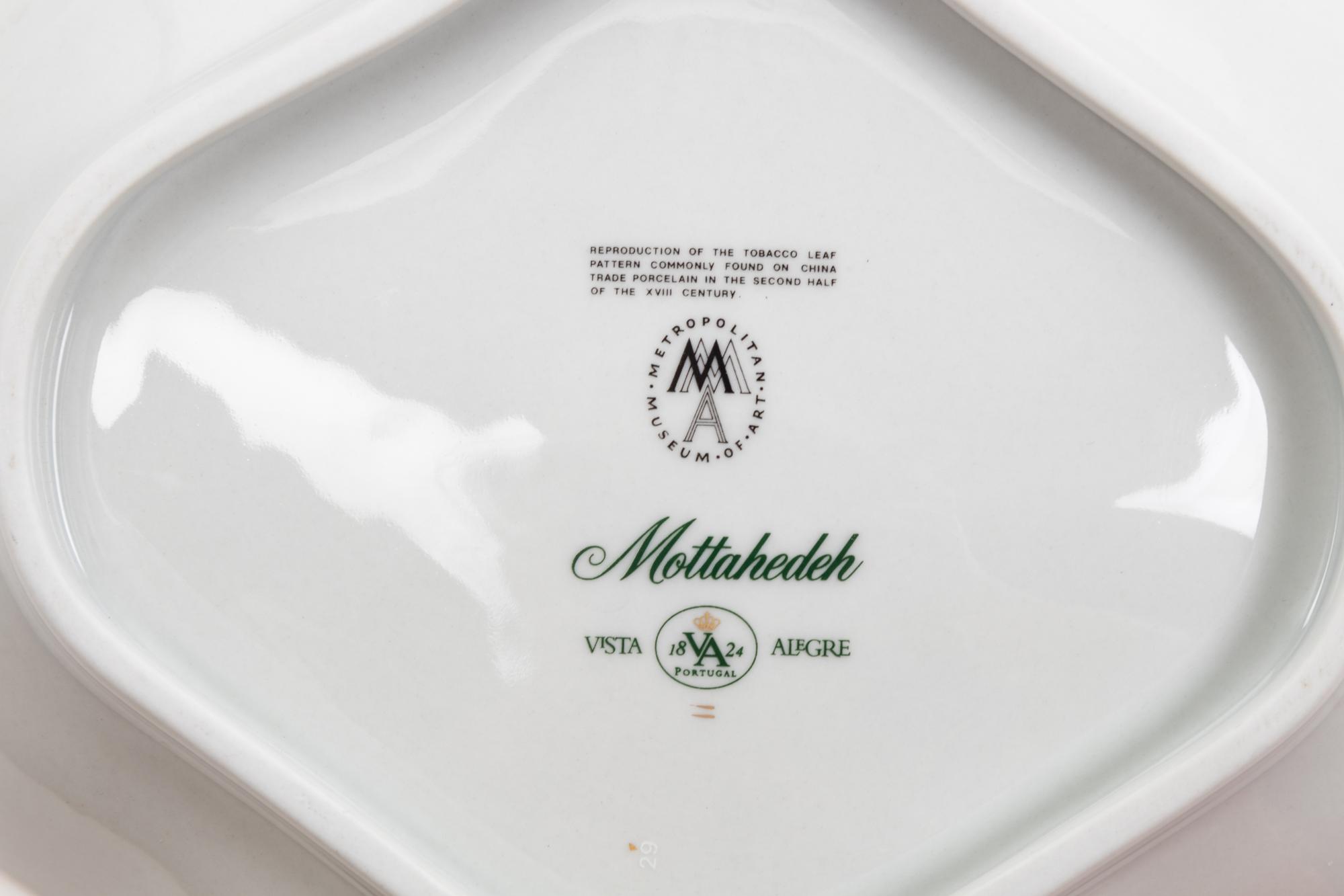 A Collection of Mottahedeh Tobacco Leaf Porcelain Articles
