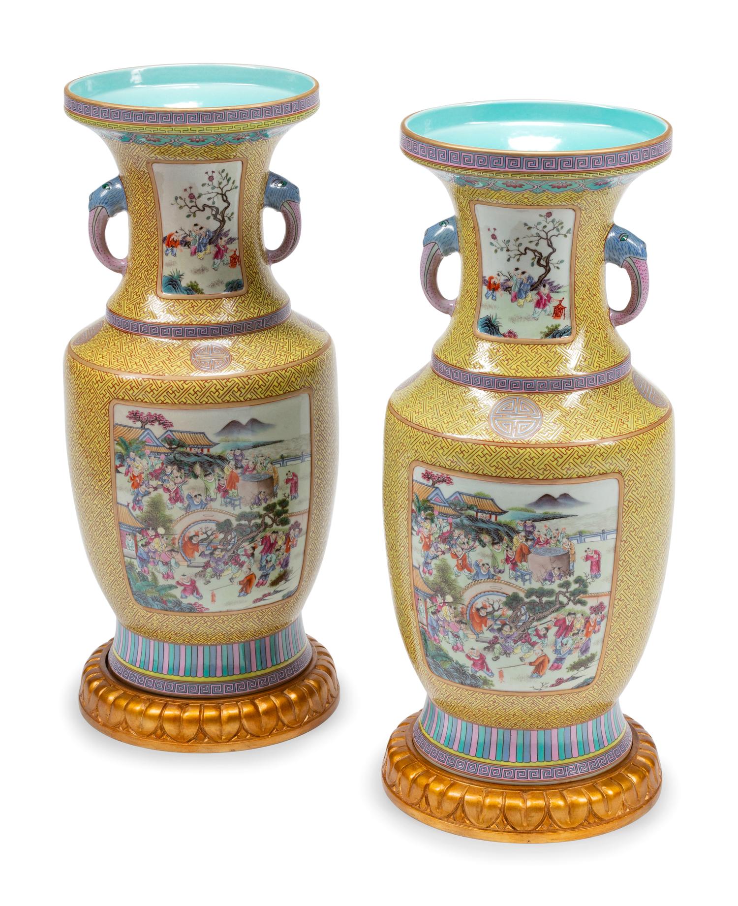 A Pair of Chinese Export Enameled Porcelain Vases with Giltwood Bases