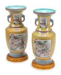 A Pair of Chinese Export Enameled Porcelain Vases with Giltwood Bases