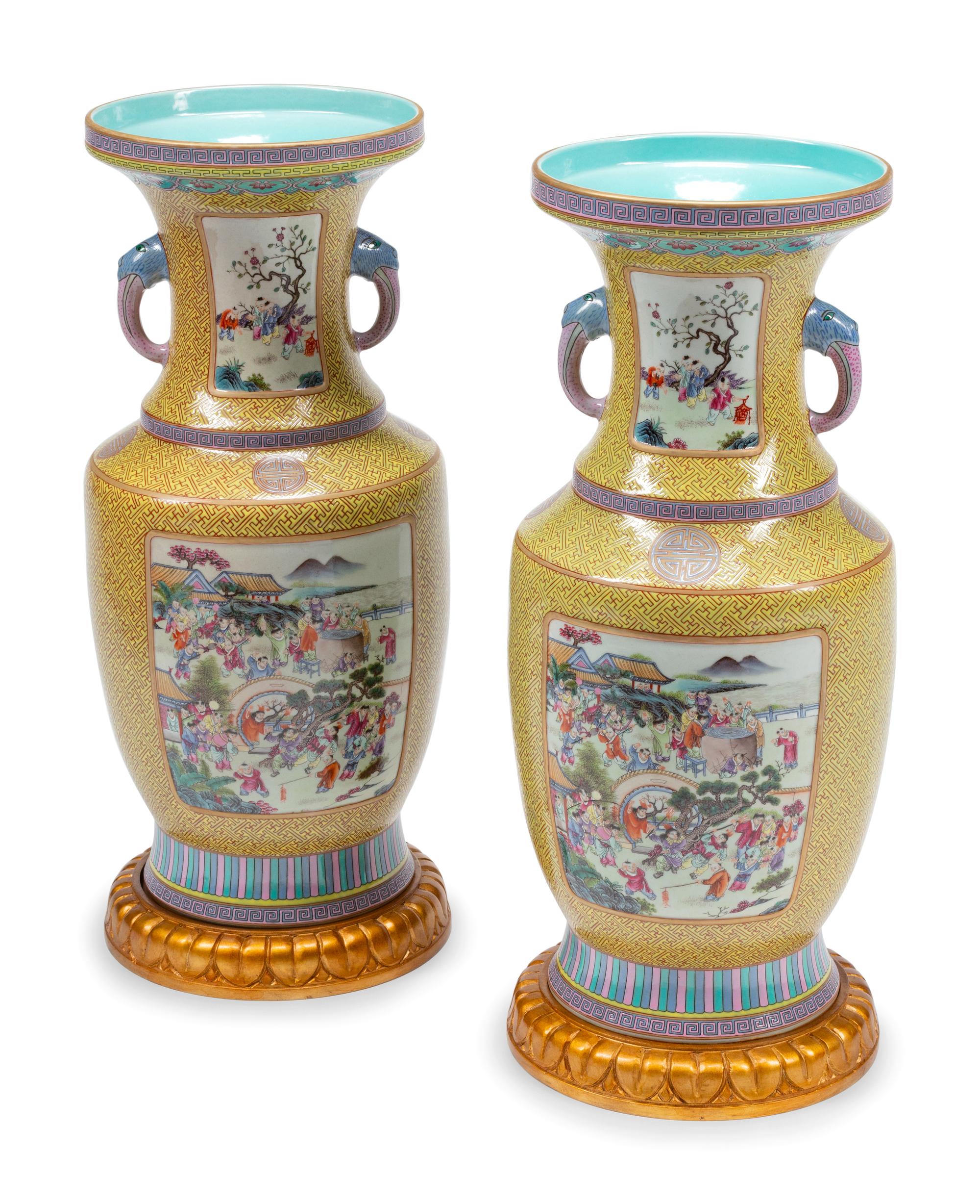 A Pair of Chinese Export Enameled Porcelain Vases with Giltwood Bases