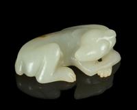 A Carved White Jade Figure of a Dog