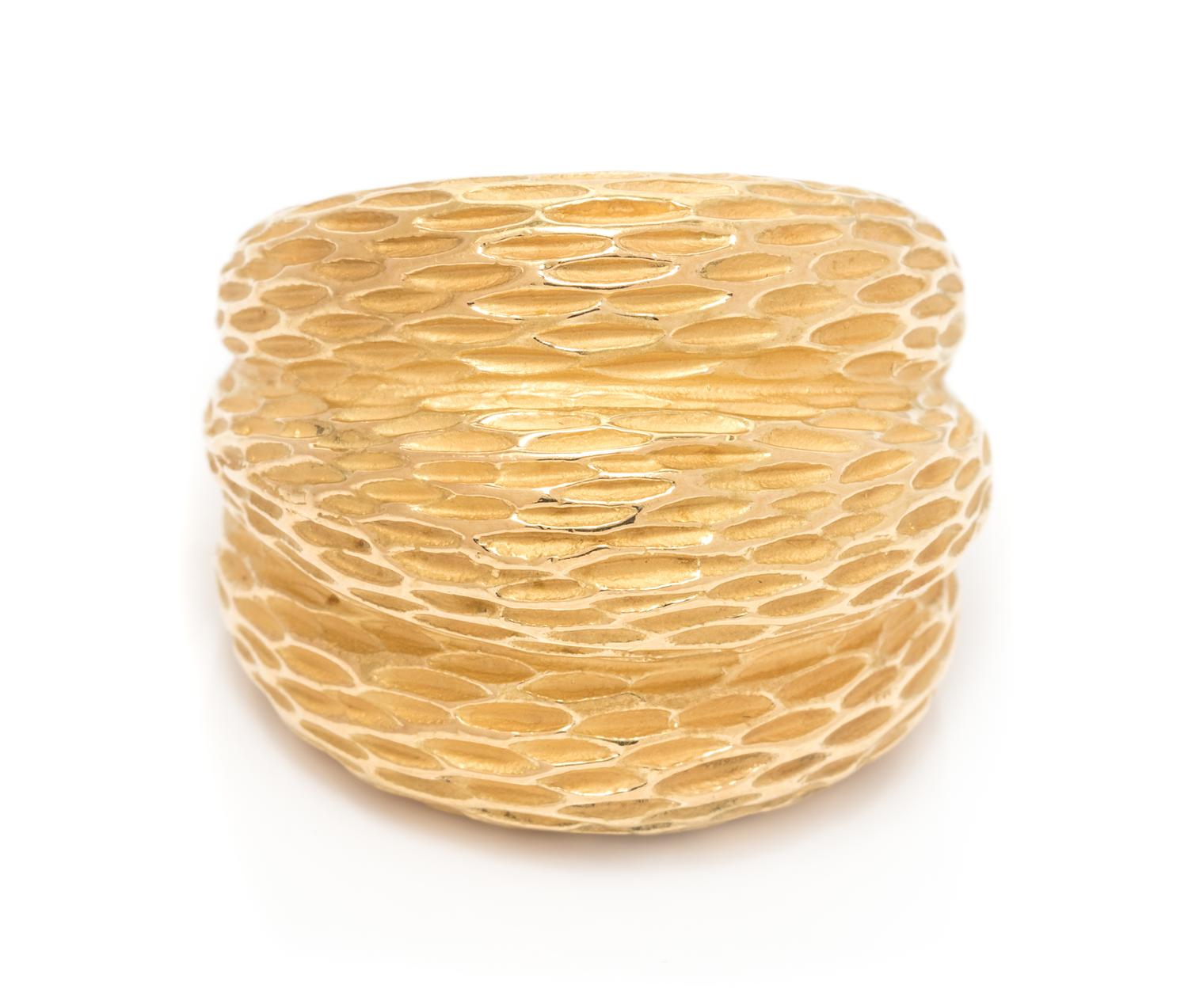 An 18 Karat Yellow Gold Bombe Ring, 18.50 dwts.