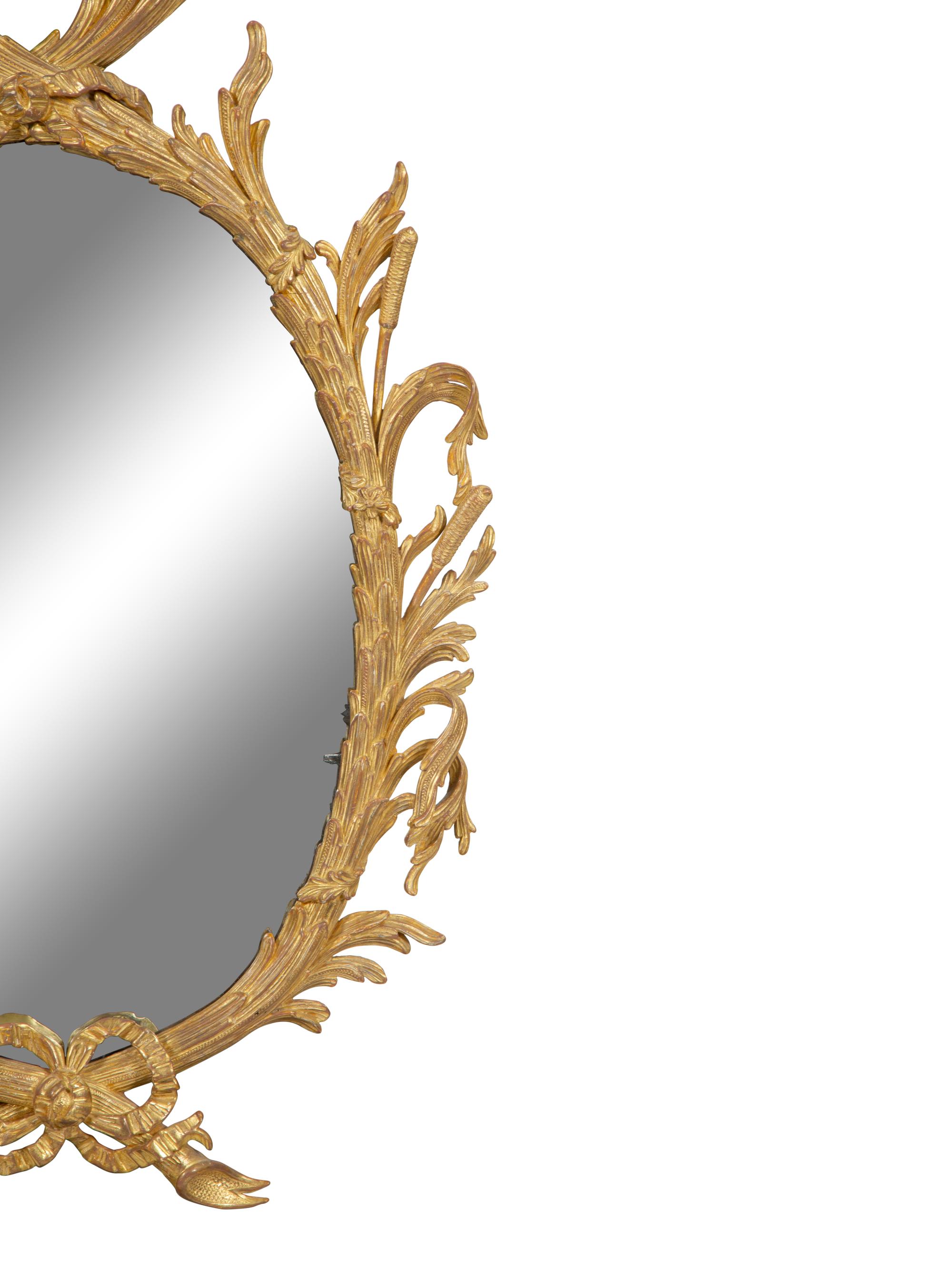 A Pair of George III Giltwood Mirrors