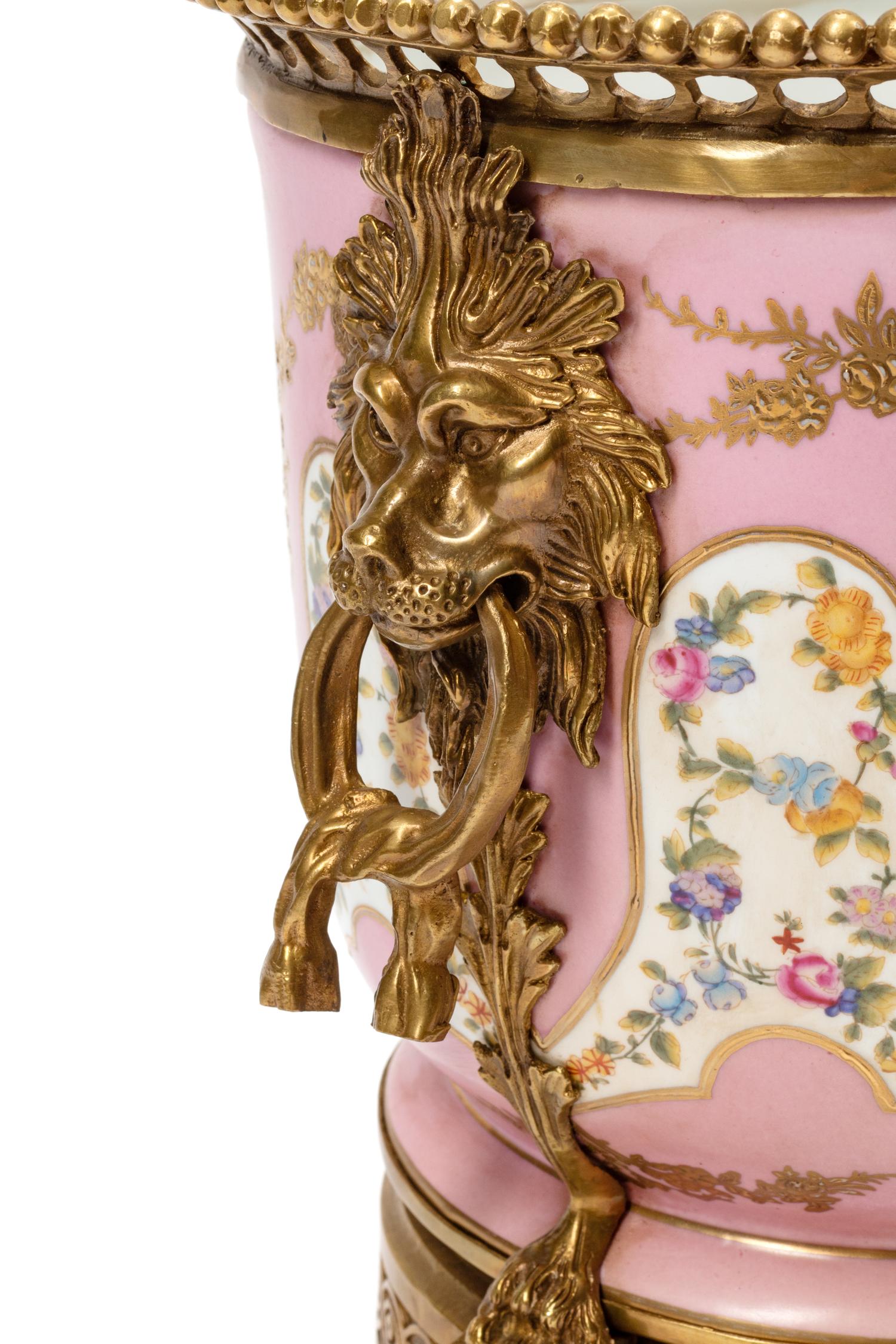 A Pair of Sèvres Style Gilt Bronze Mounted Porcelain Cache Pots