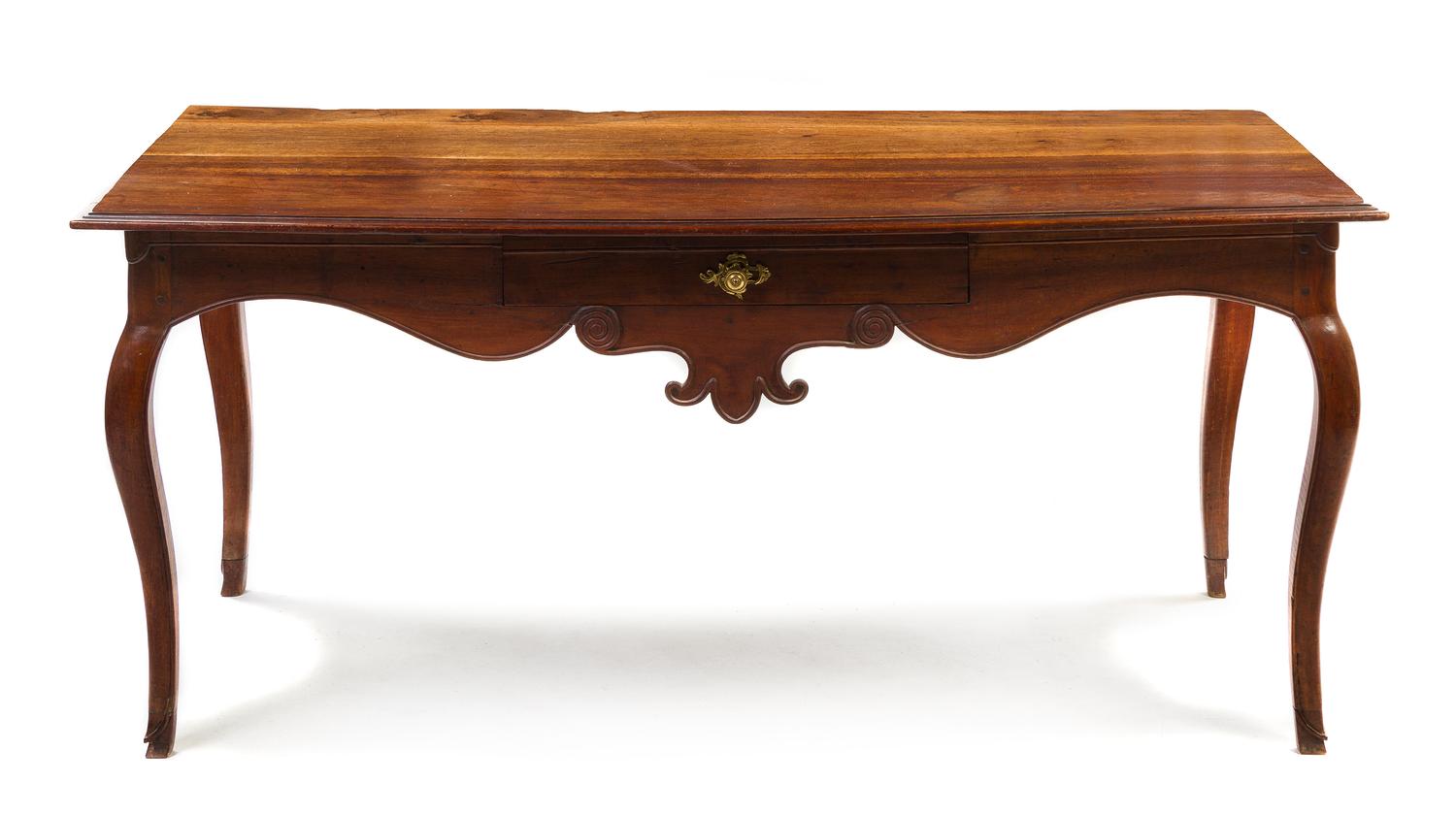 A French Provincial Walnut Library Table, Height 29 x width 65 1/4 x depth 34 inches.