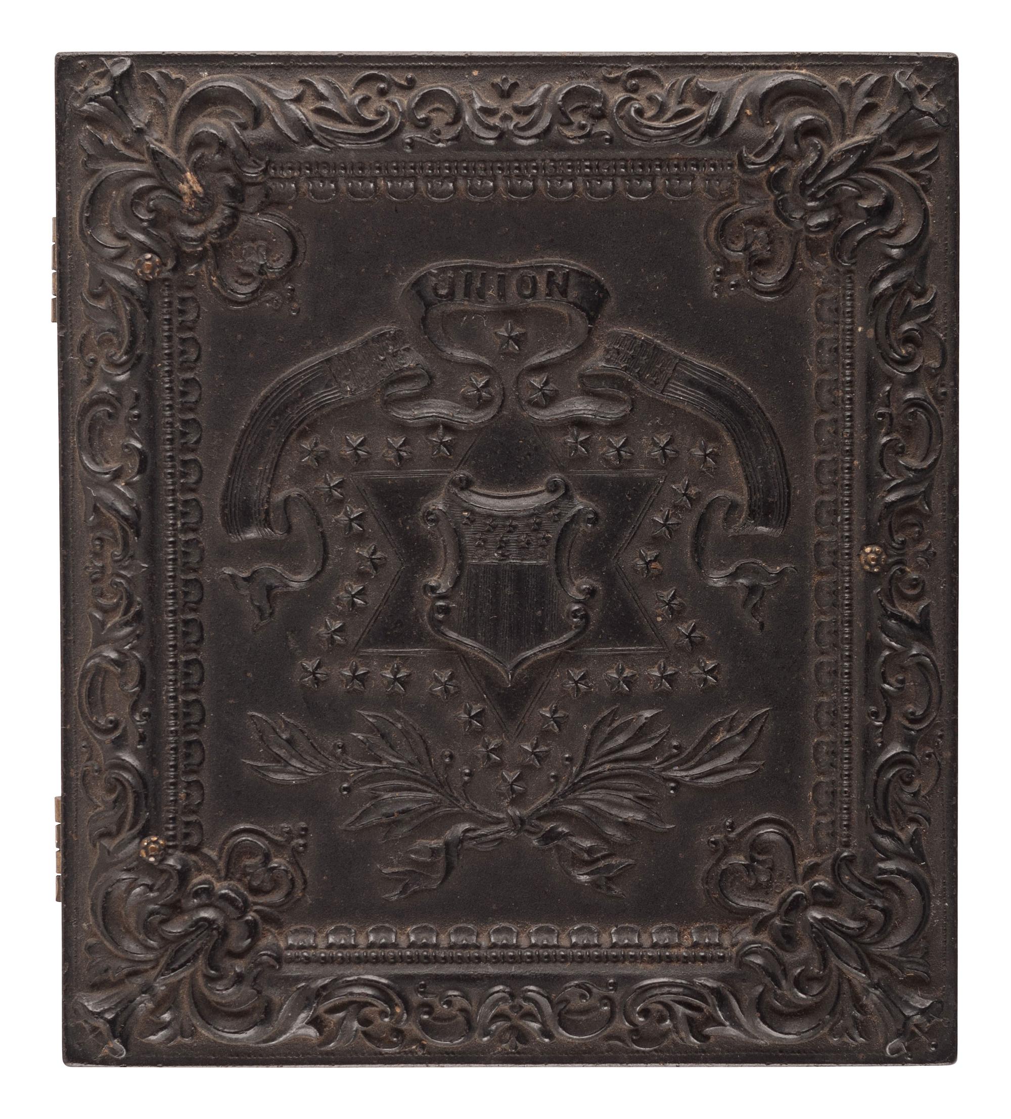 [CIVIL WAR]. Sixth plate ambrotype of Annapolis Naval Cadet Roswell Morey housed in Union case with patriotic motif.