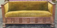 An Arts and Craft Oak Settle. Width 69 inches.