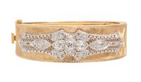 A Platinum, Yellow Gold and Diamond Bangle, 30.50 dwts.