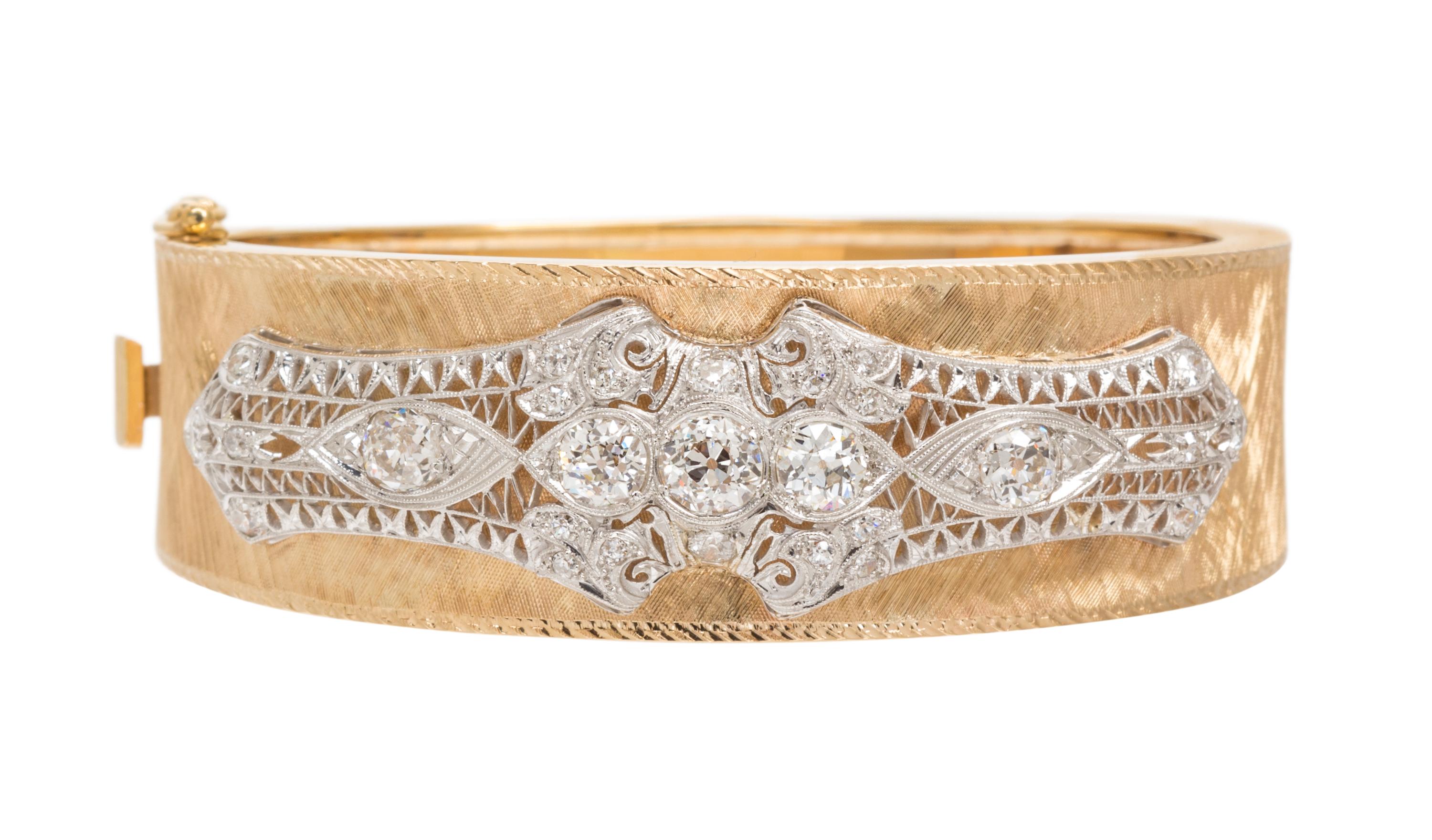 A Platinum, Yellow Gold and Diamond Bangle, 30.50 dwts.