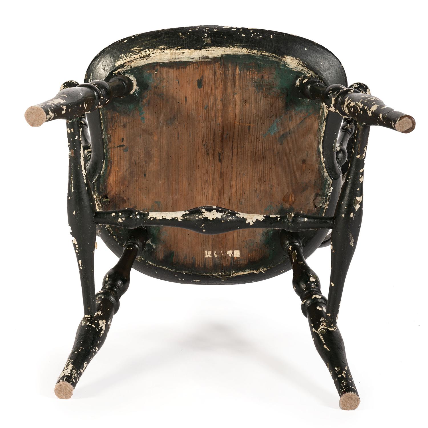 A Pair of Black-Painted Continuous Arm Windsor Chairs