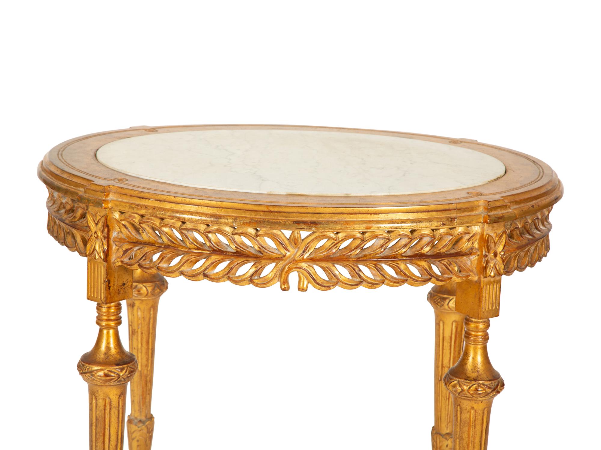 A Continental Giltwood Oval Table with Inset Marble Top — 19th/20th Century