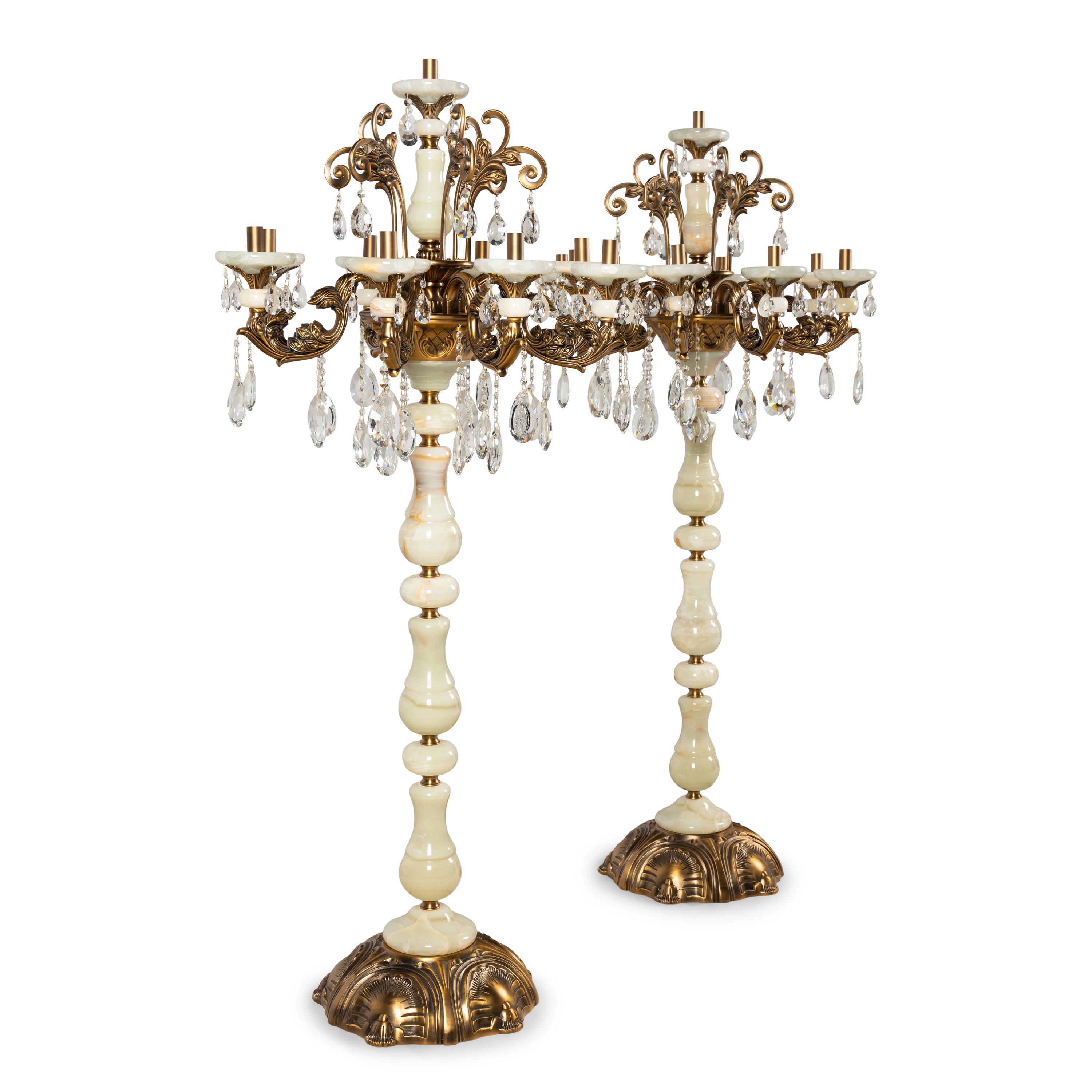A Pair of Brass Mounted Onyx Nine-Light Torchères