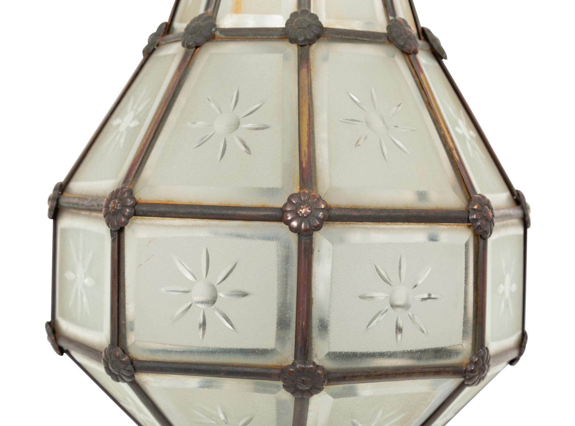 A Bronze and Glass Wall Sconce