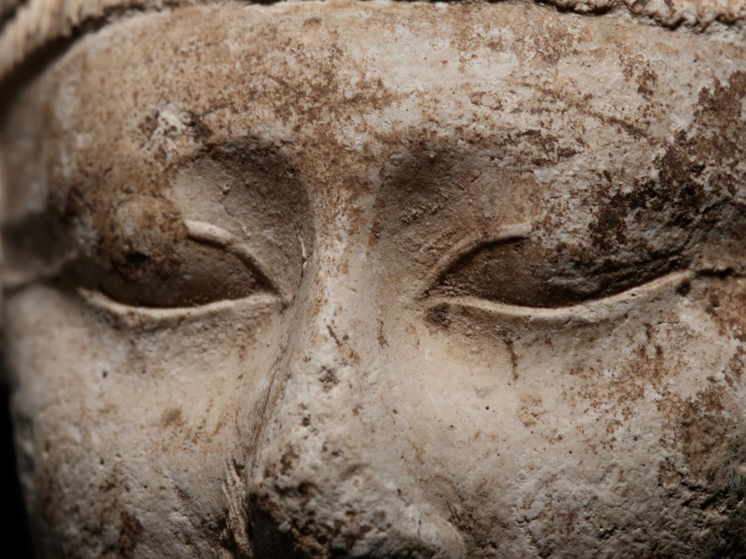An Egyptian Limestone Head of a Noblewoman