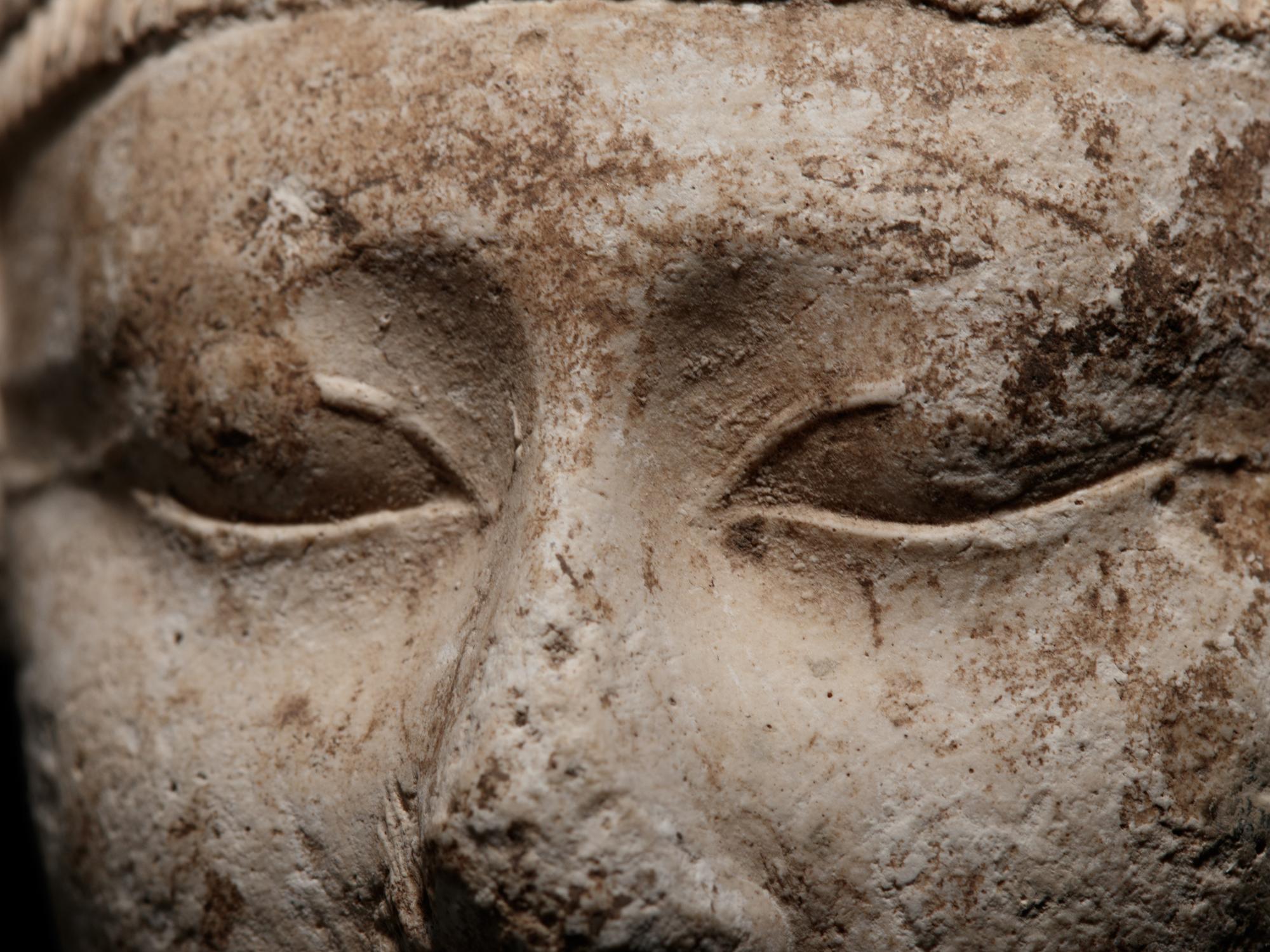An Egyptian Limestone Head of a Noblewoman
