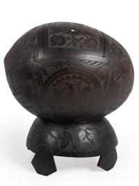 [AMERICANA]. Patriotic carved coconut shell with display stand.