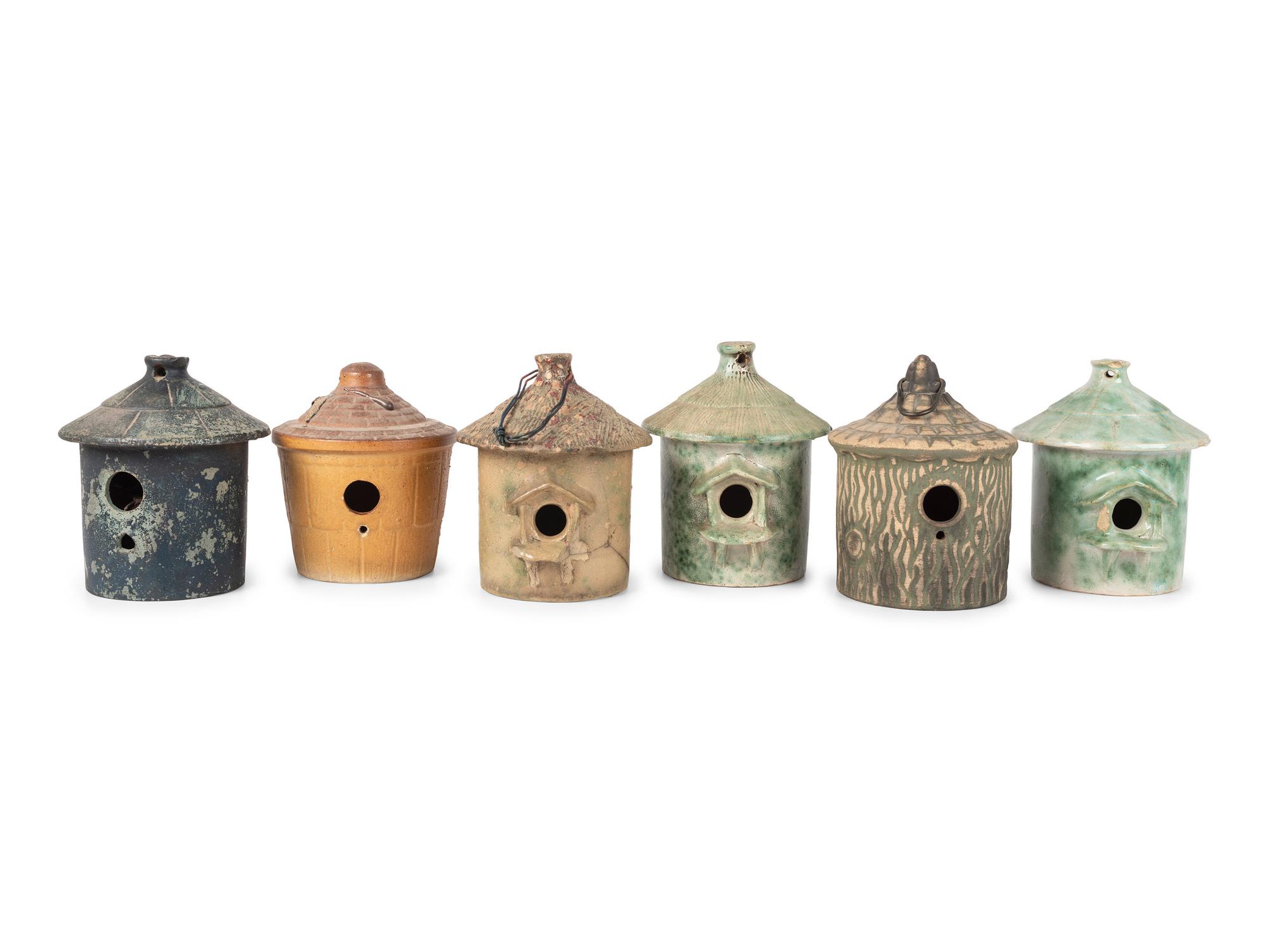 Six Stoneware Birdhouses, Including Dalton Pottery