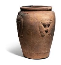An Egyptian Pottery Jar with Head of Hathor