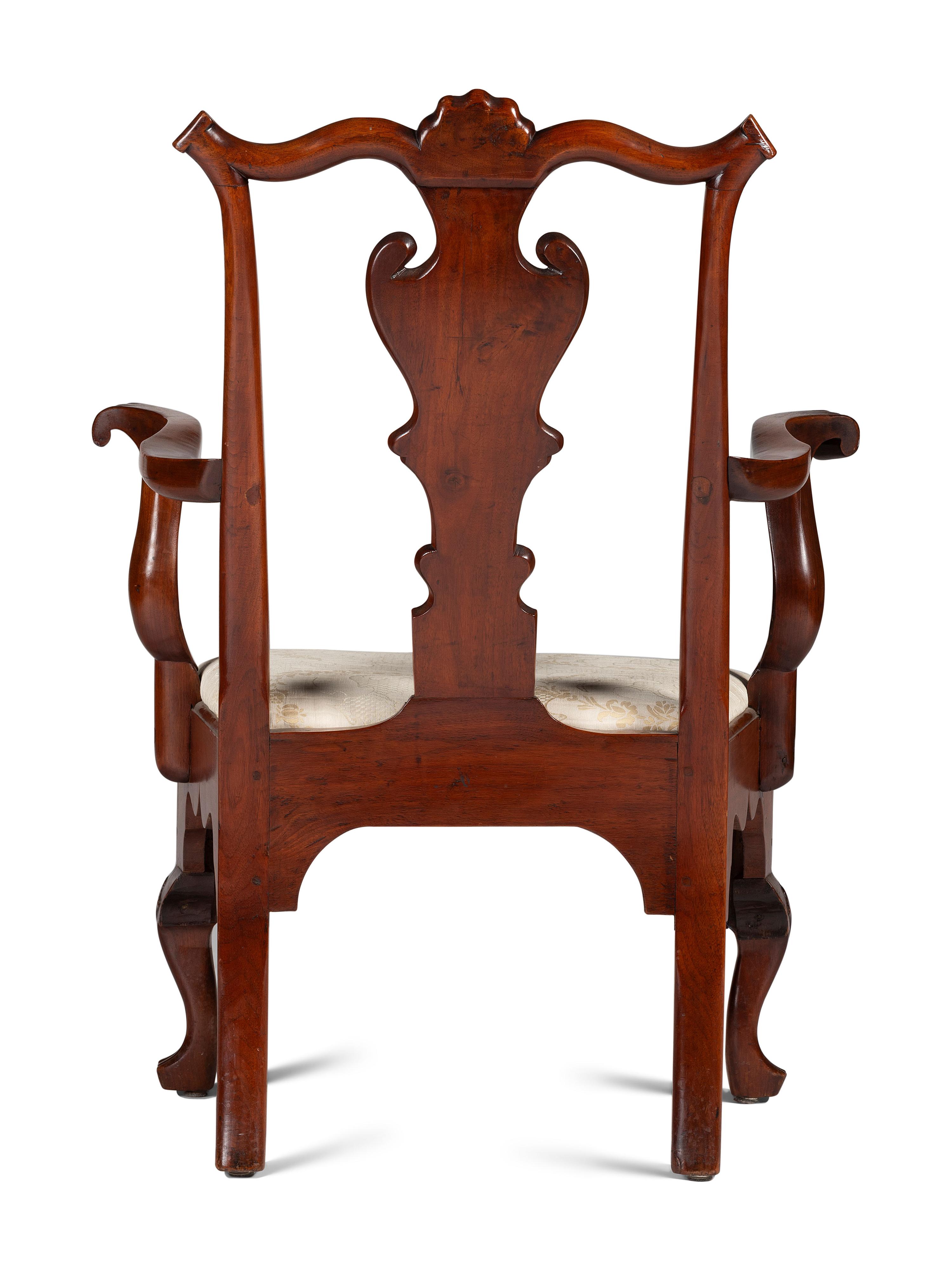 A Queen Anne Carved Walnut Armchair