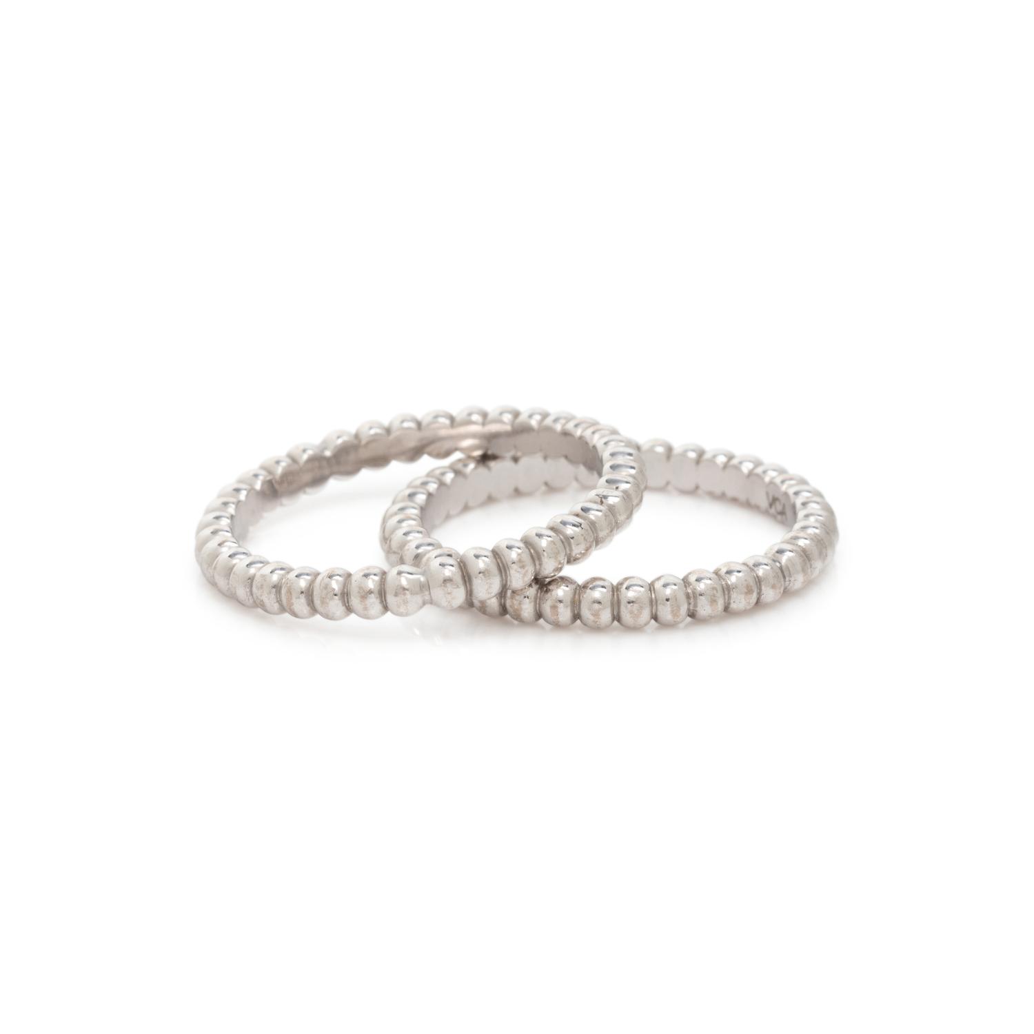 VAN CLEEF & ARPELS, PAIR OF WHITE GOLD 'PERL É E' BANDS