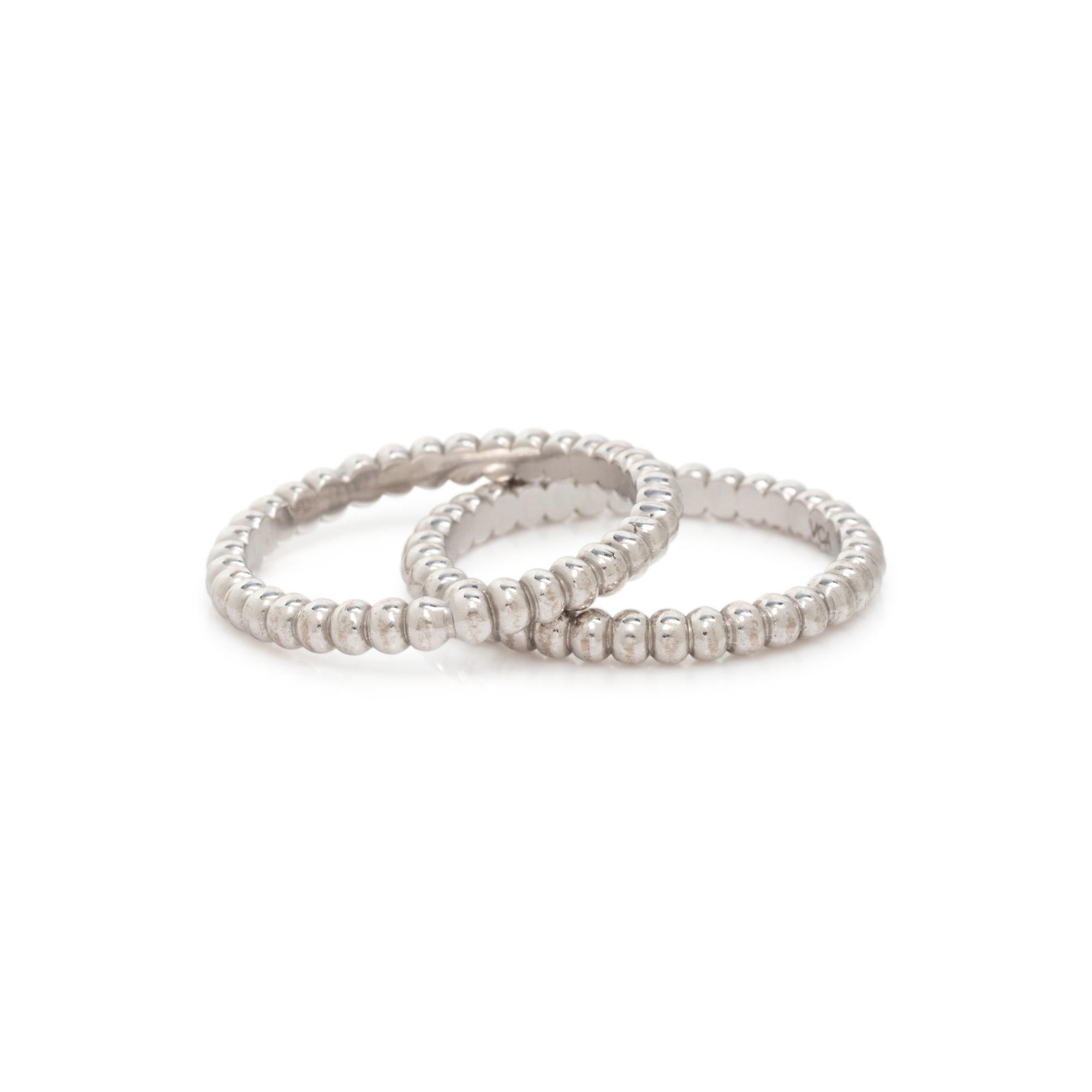 VAN CLEEF & ARPELS, PAIR OF WHITE GOLD 'PERL É E' BANDS