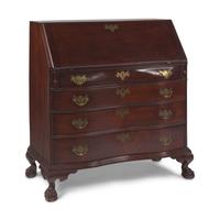 A Chippendale Carved Mahogany Oxbow Slant-Front Desk