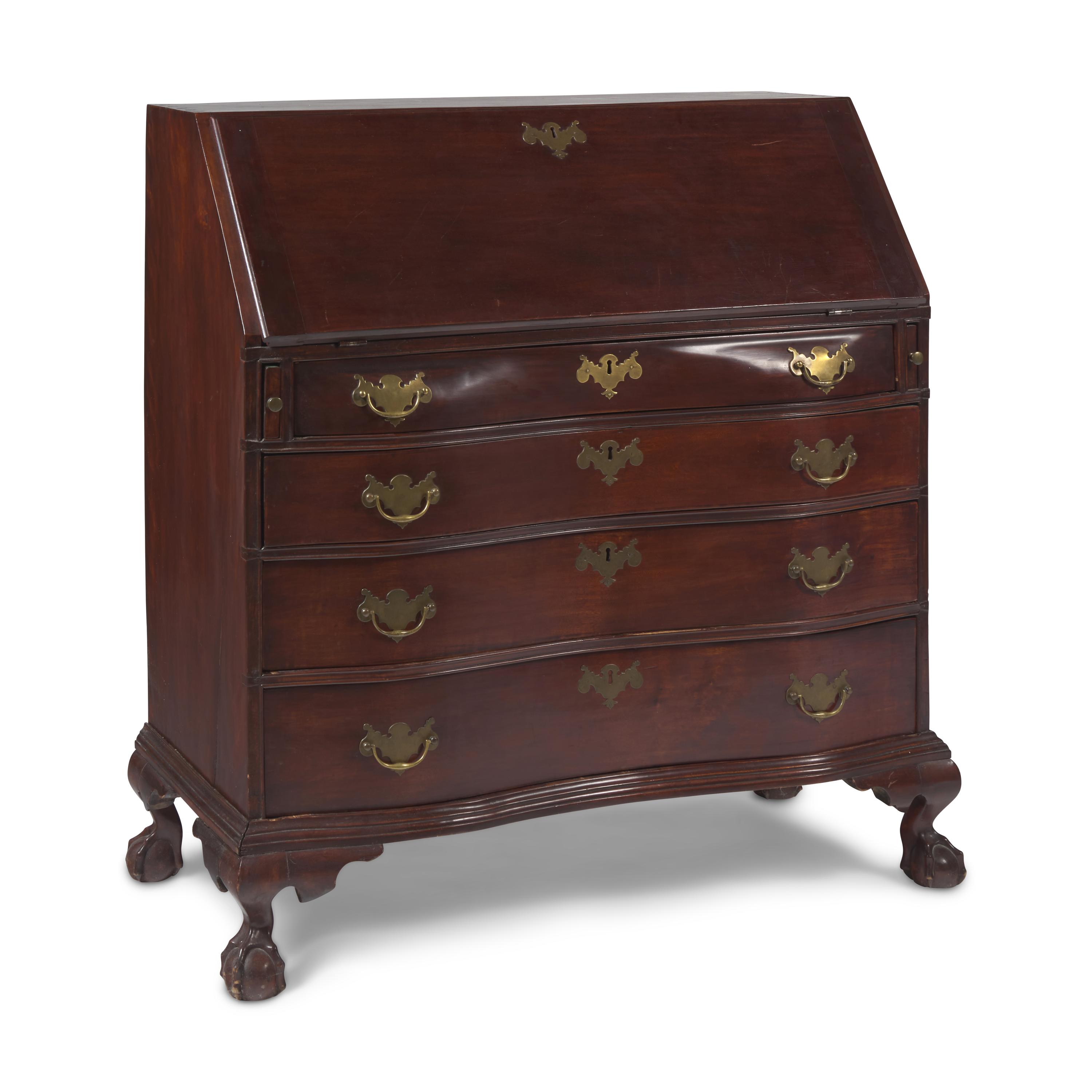 A Chippendale Carved Mahogany Oxbow Slant-Front Desk