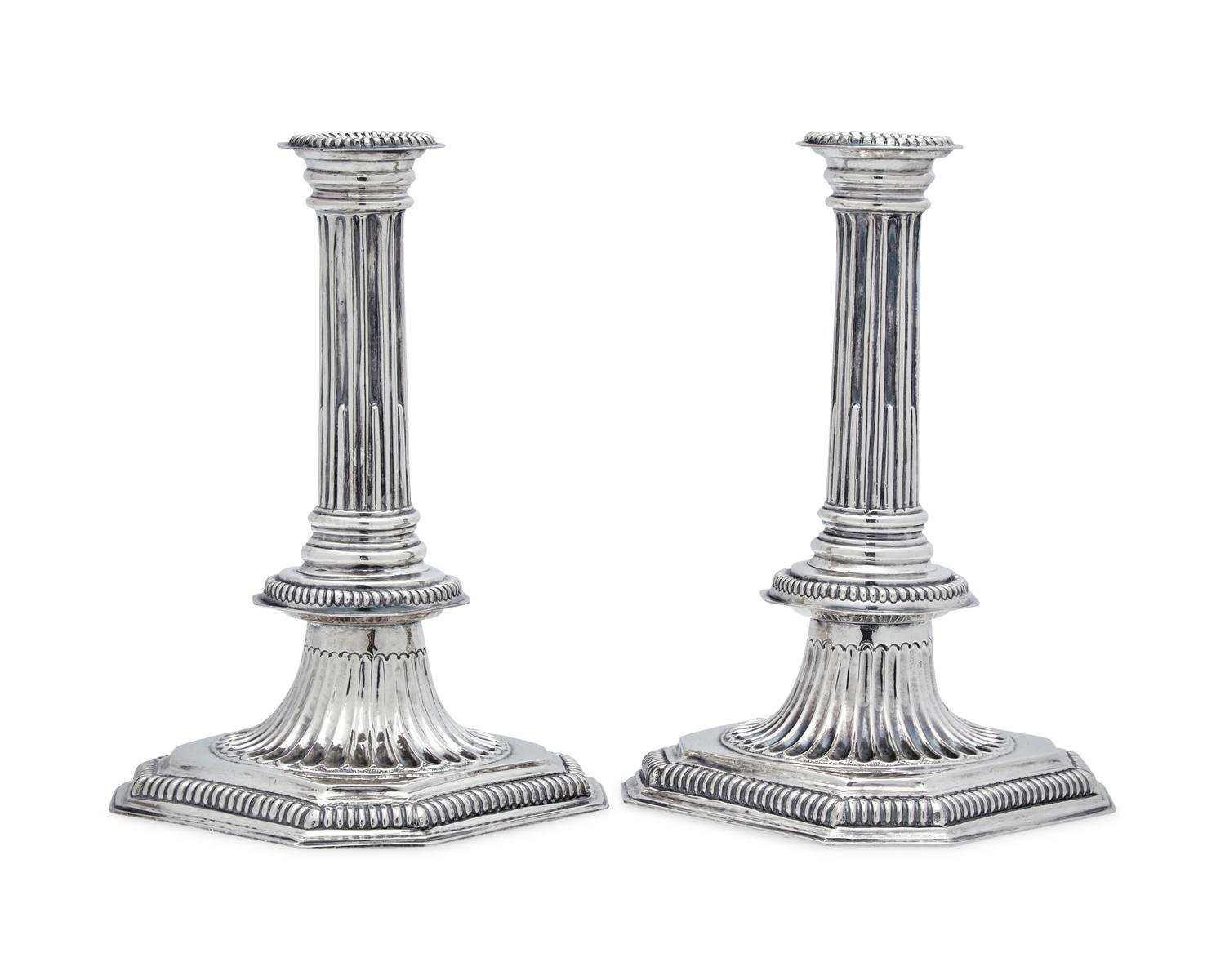 A Rare Pair of William III Britannia Silver Candlesticks