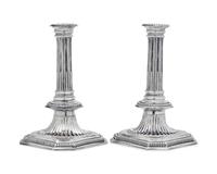 A Rare Pair of William III Britannia Silver Candlesticks