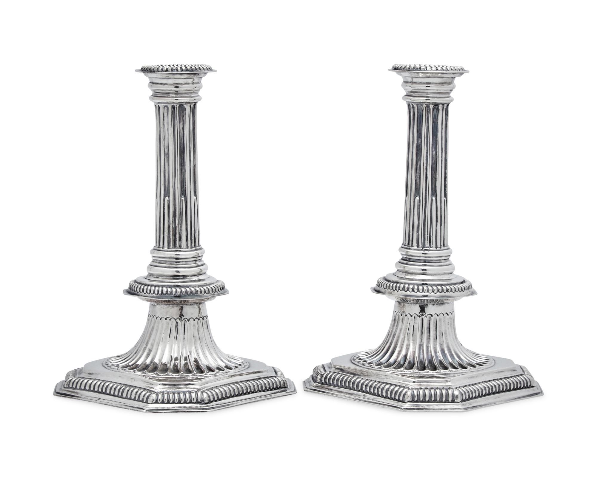 A Rare Pair of William III Britannia Silver Candlesticks