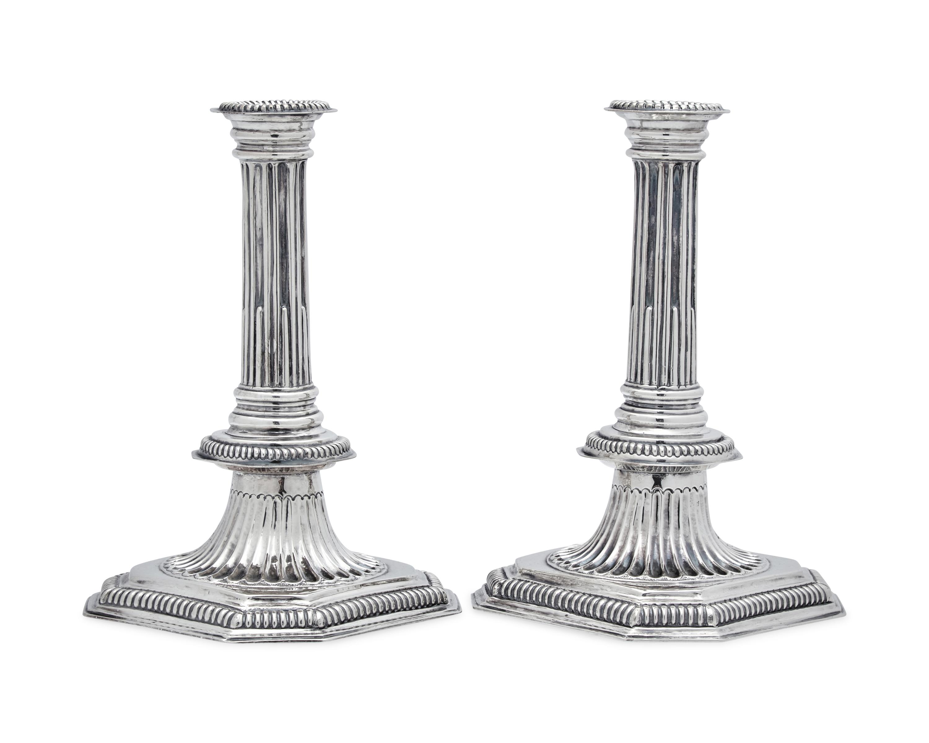 A Rare Pair of William III Britannia Silver Candlesticks