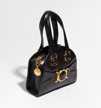 A Gianni Versace Black Leather Mini Medusa Handbag, 6.75" x 6" x 2.5"; Handle drop: 4".