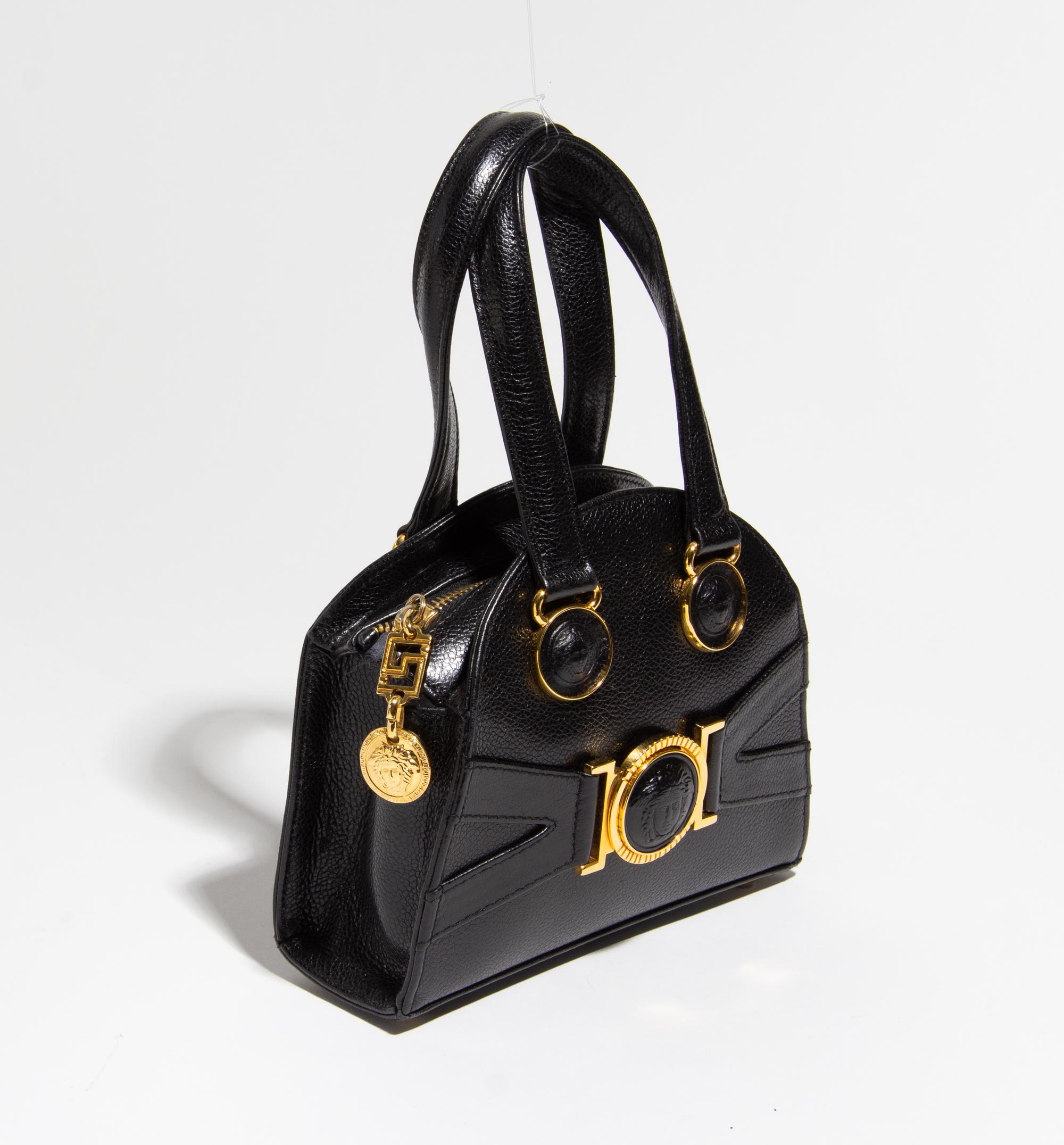 A Gianni Versace Black Leather Mini Medusa Handbag, 6.75" x 6" x 2.5"; Handle drop: 4".