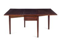 A George III Figured and Channel-Molded Mahogany Drop-Leaf Dining Table