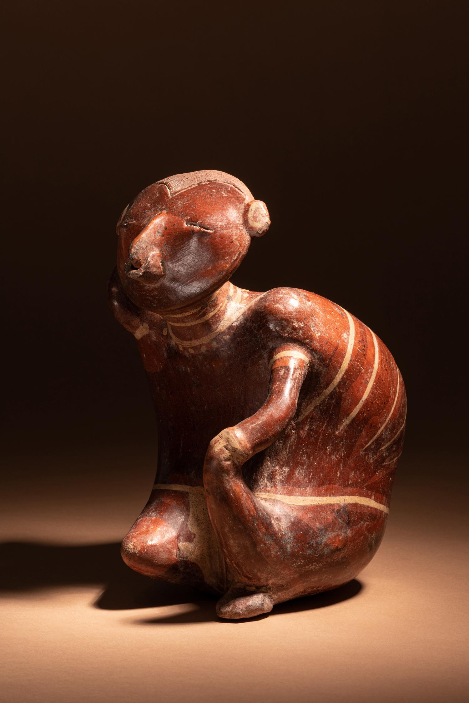 A Nayarit Terracotta Seated Figure