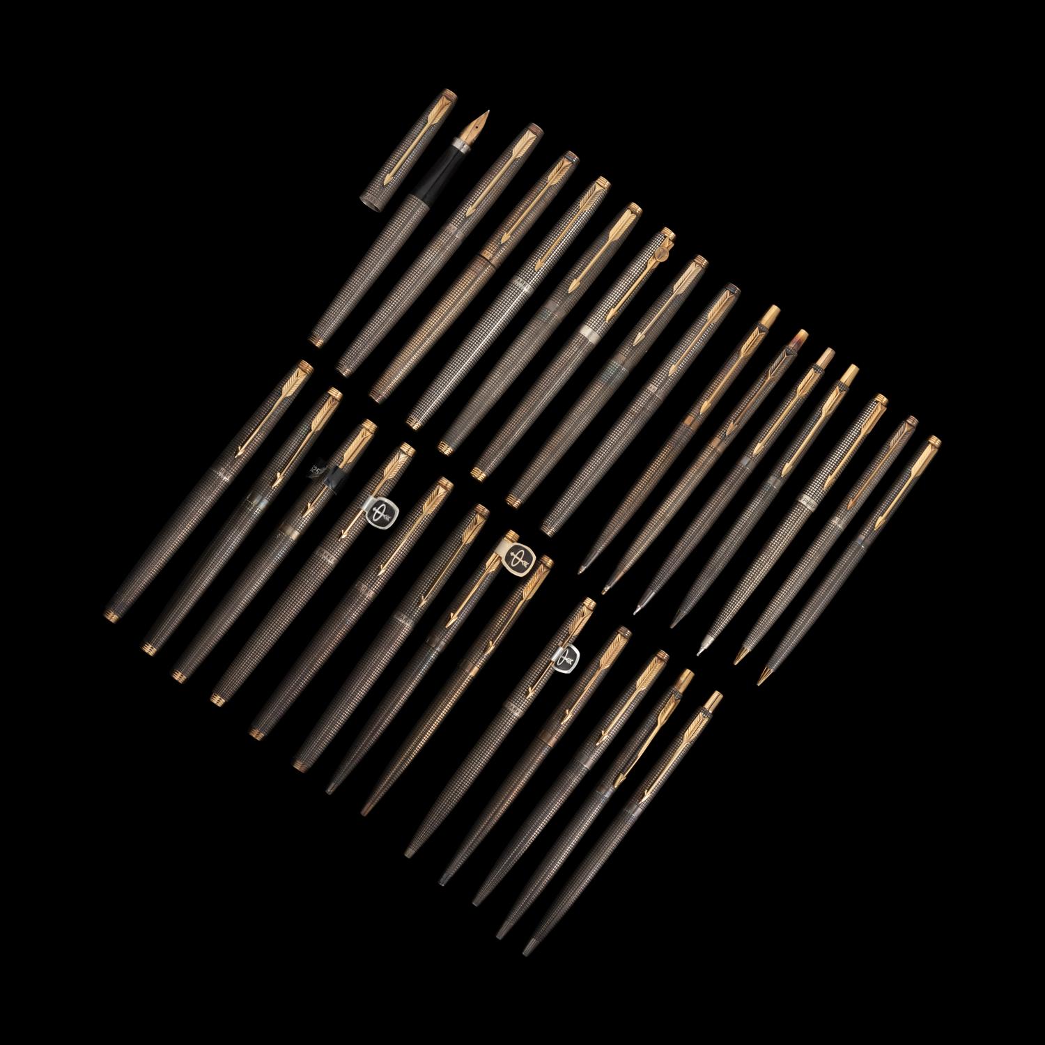 A Set of Twenty-Eight Silver Parker Writing Instruments