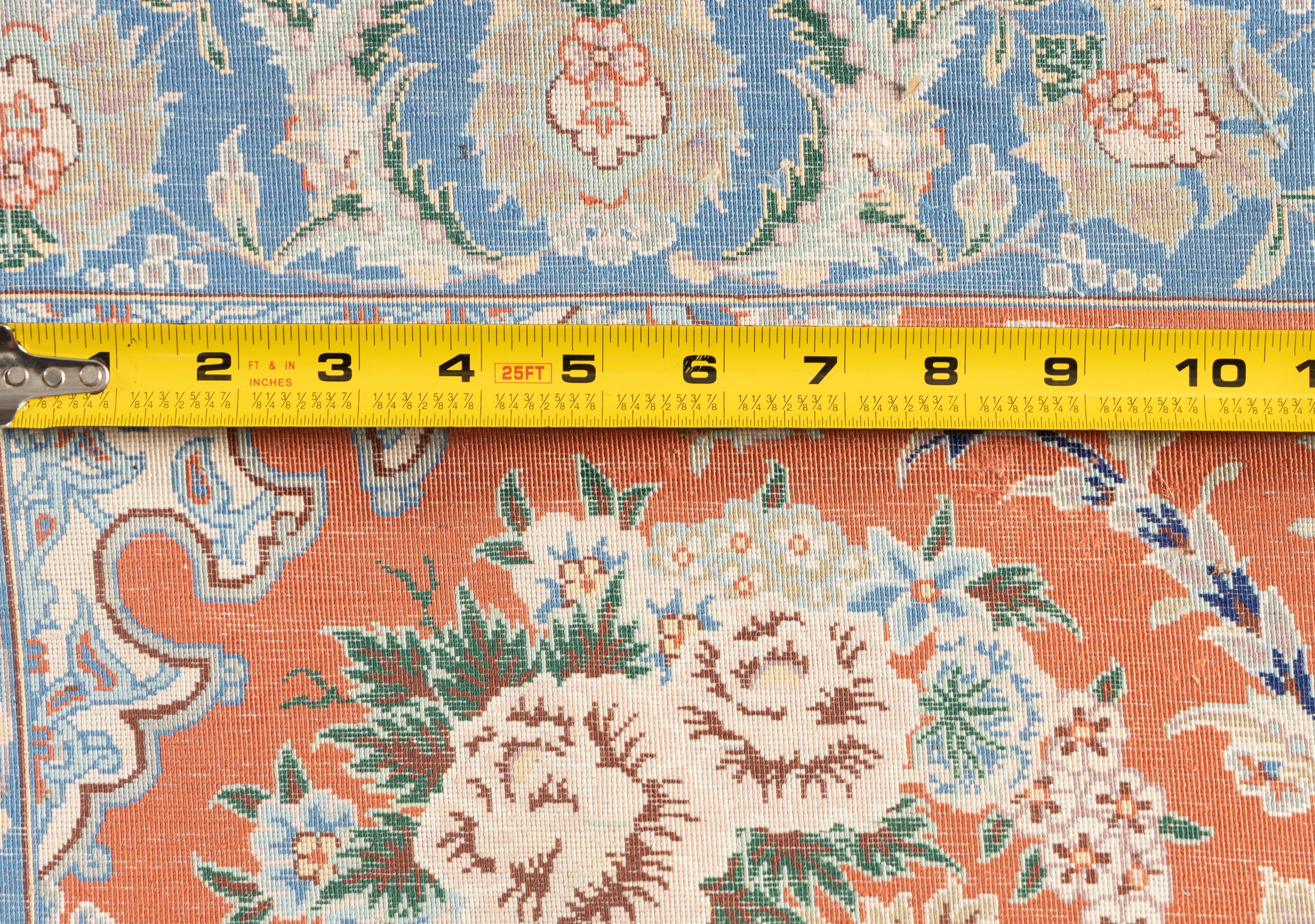 A Tabriz Silk Carpet