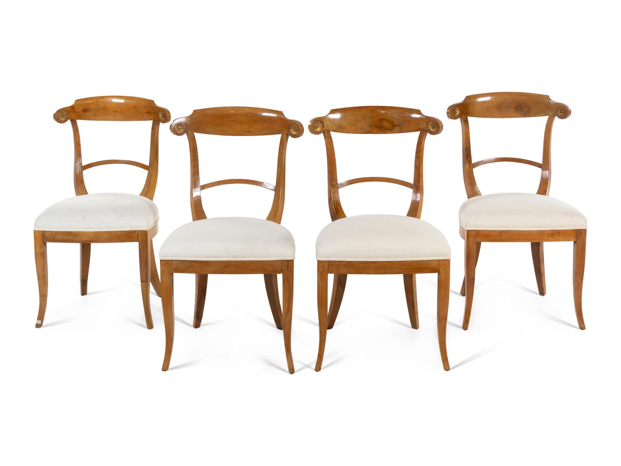 A Set of Four Biedermeier Fruitwood Dining Chairs