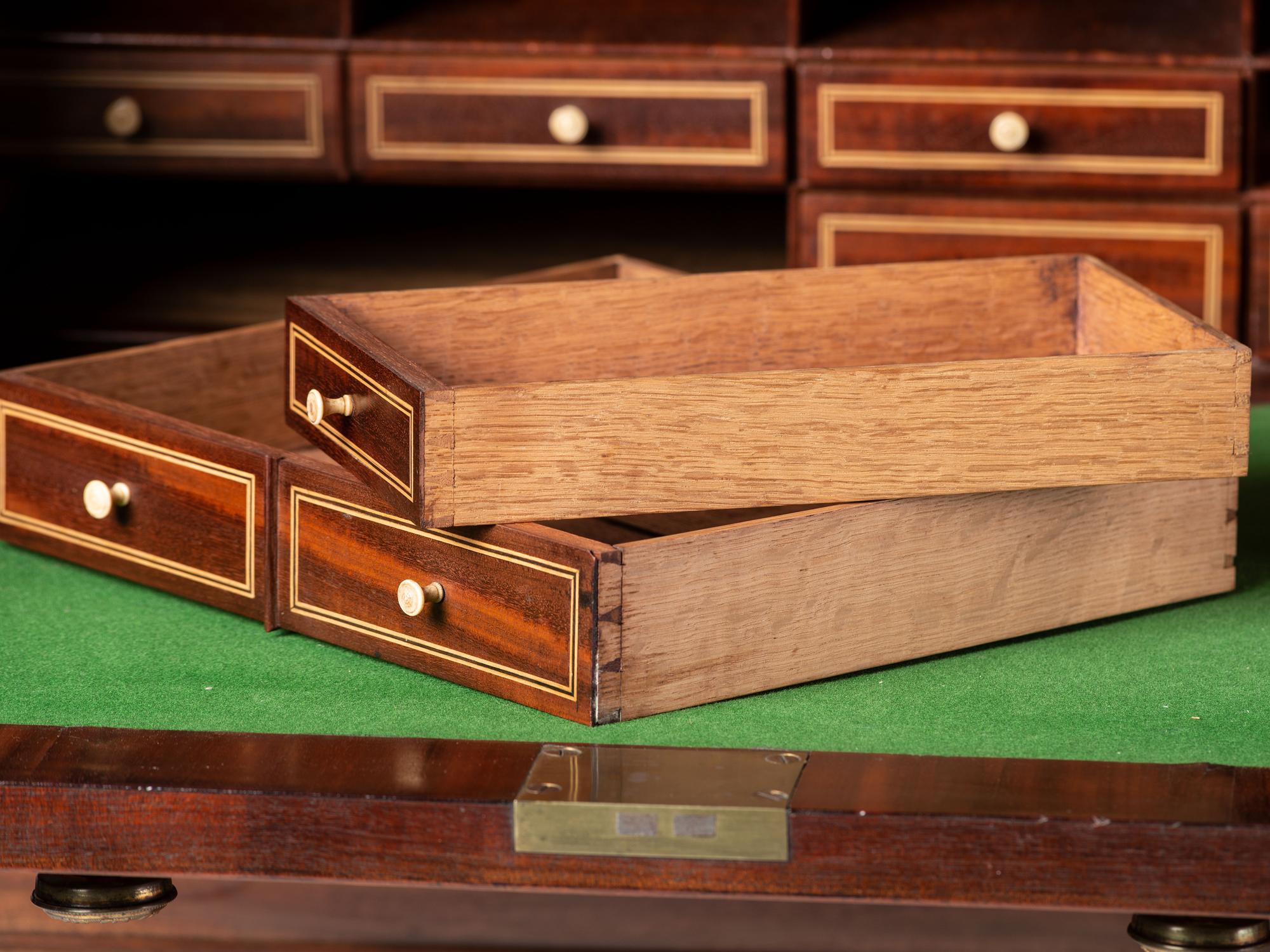 An English Mahogany Breakfront Bookcase