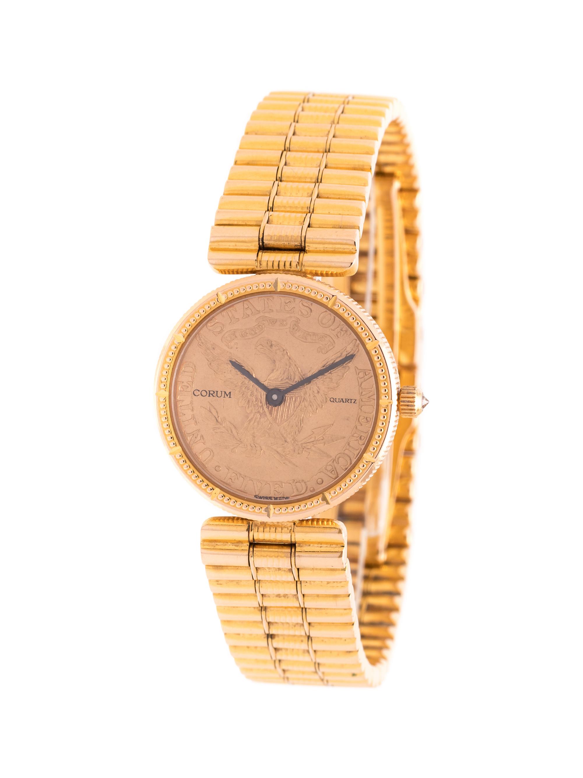 CORUM, YELLOW GOLD AND US $5 COIN WRISTWATCH