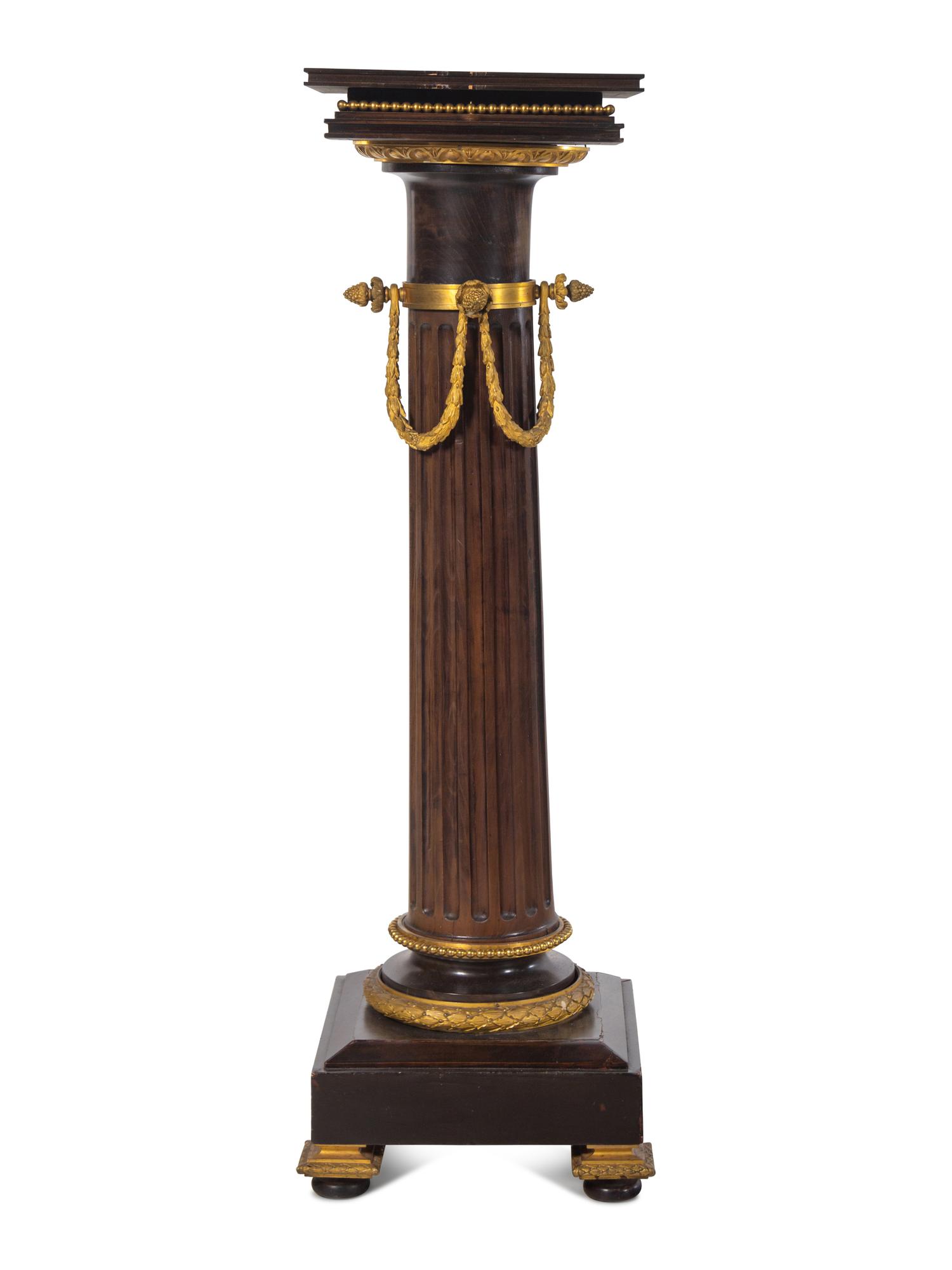 A Continental Gilt Bronze Mounted Walnut Pedestal
