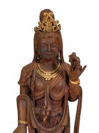 A Carved and Gilt Guanyin Statue